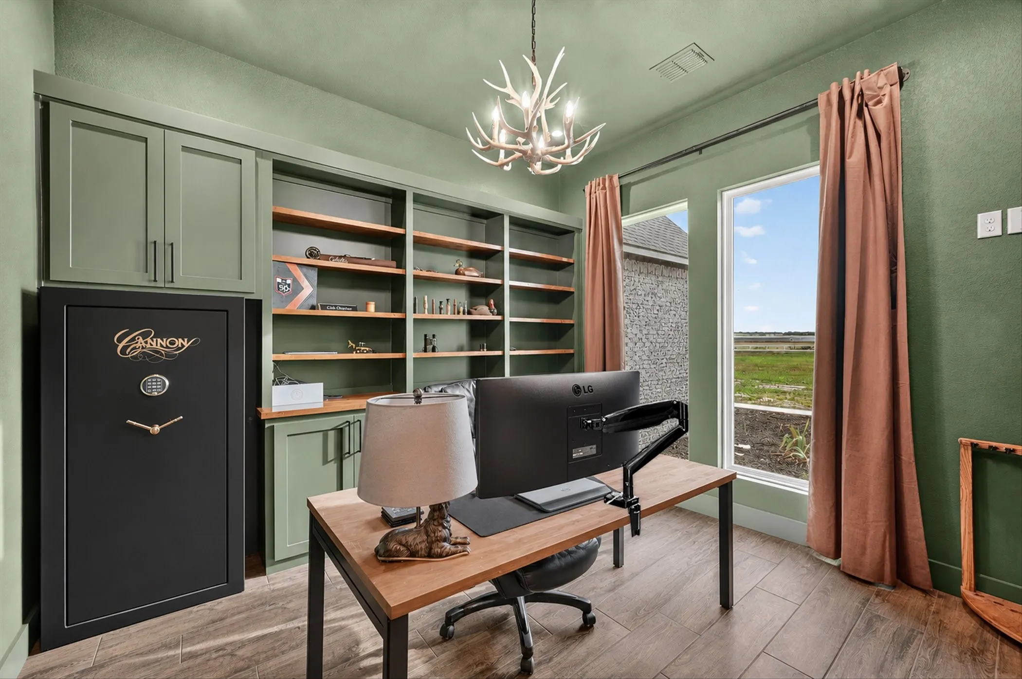 Custom built-in shelving and cabinetry complement the rich wood-look tile flooring