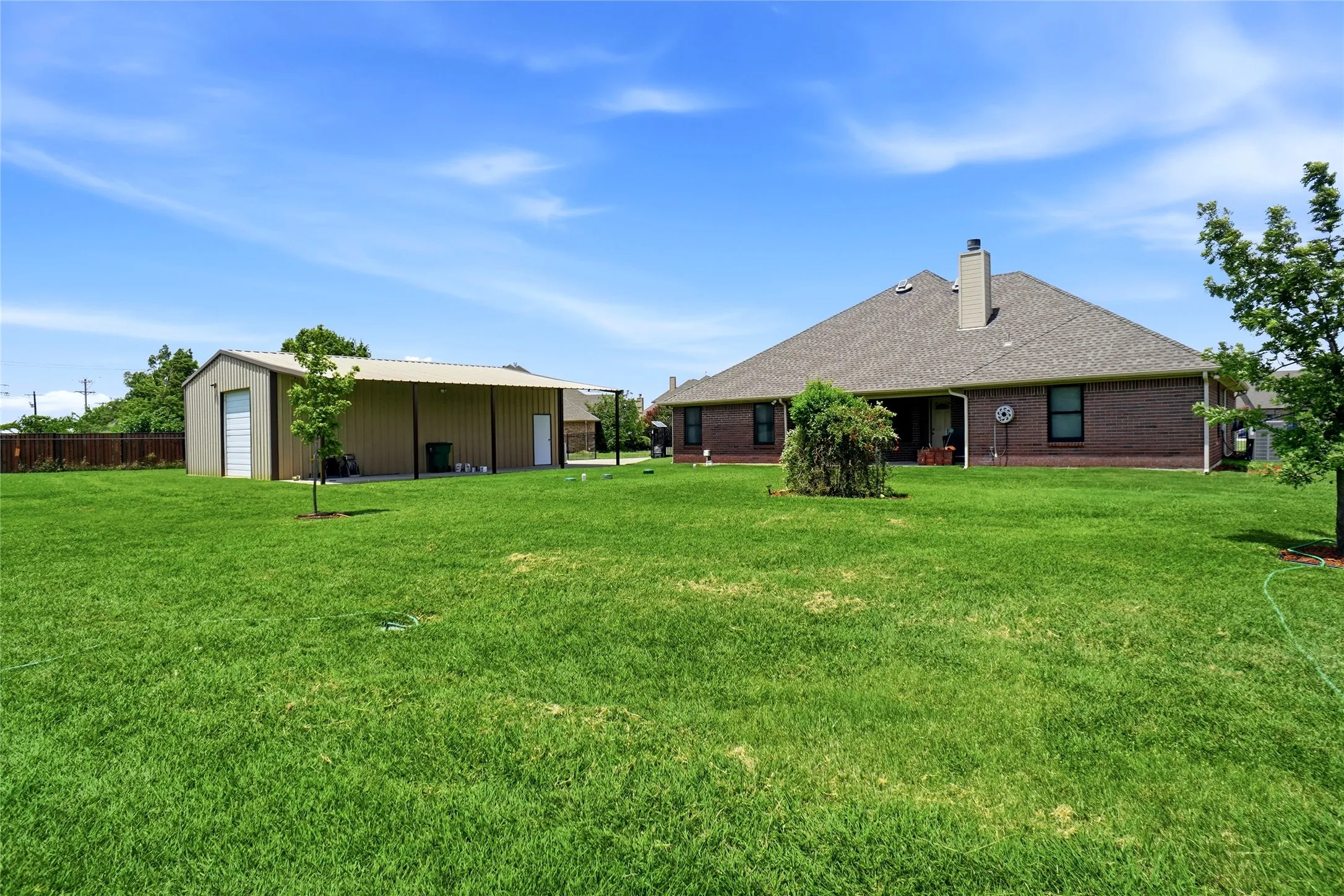 Expansive green lawn providing abundant outdoor space