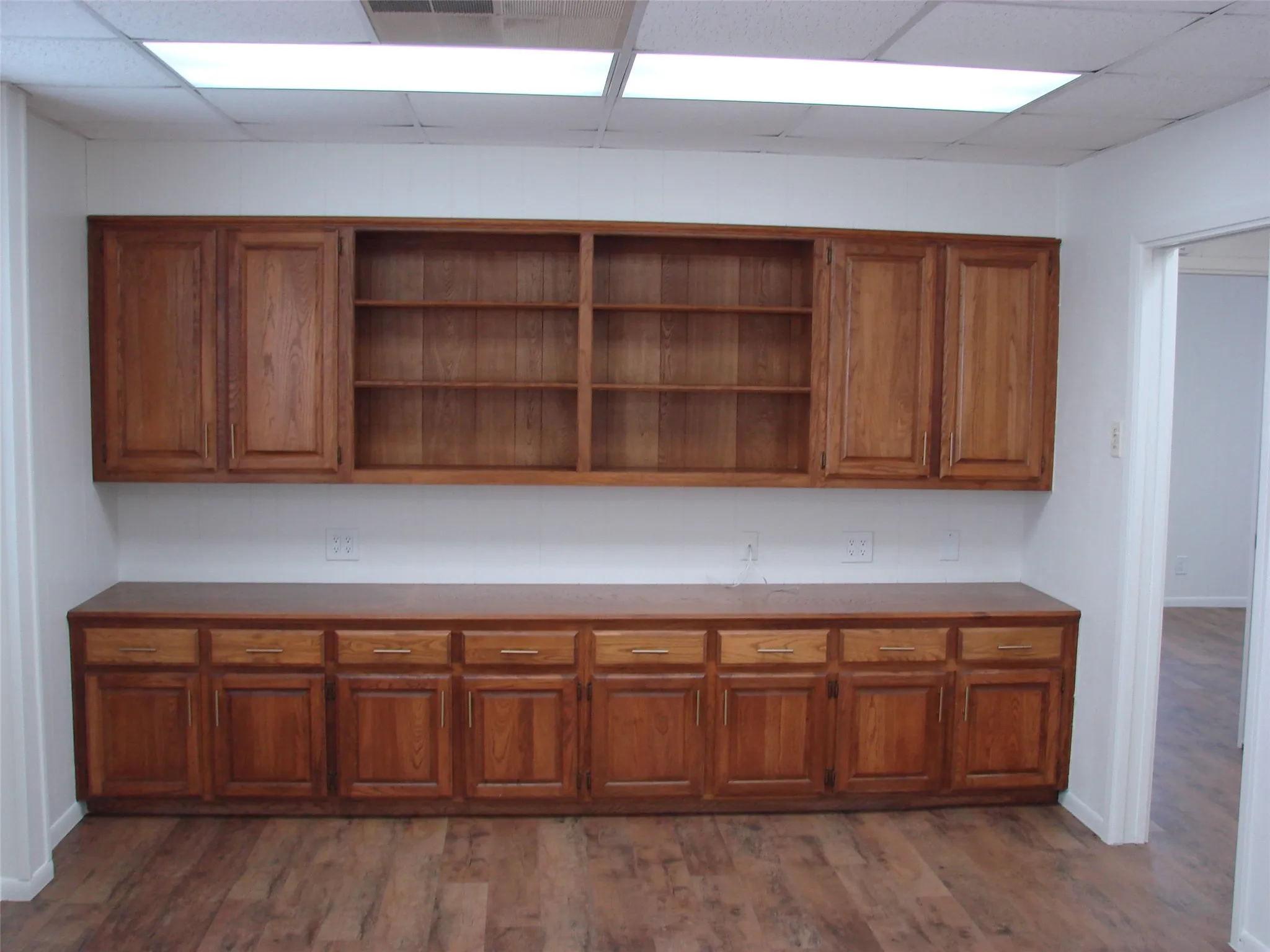 Suite A office with built-in cabinetry