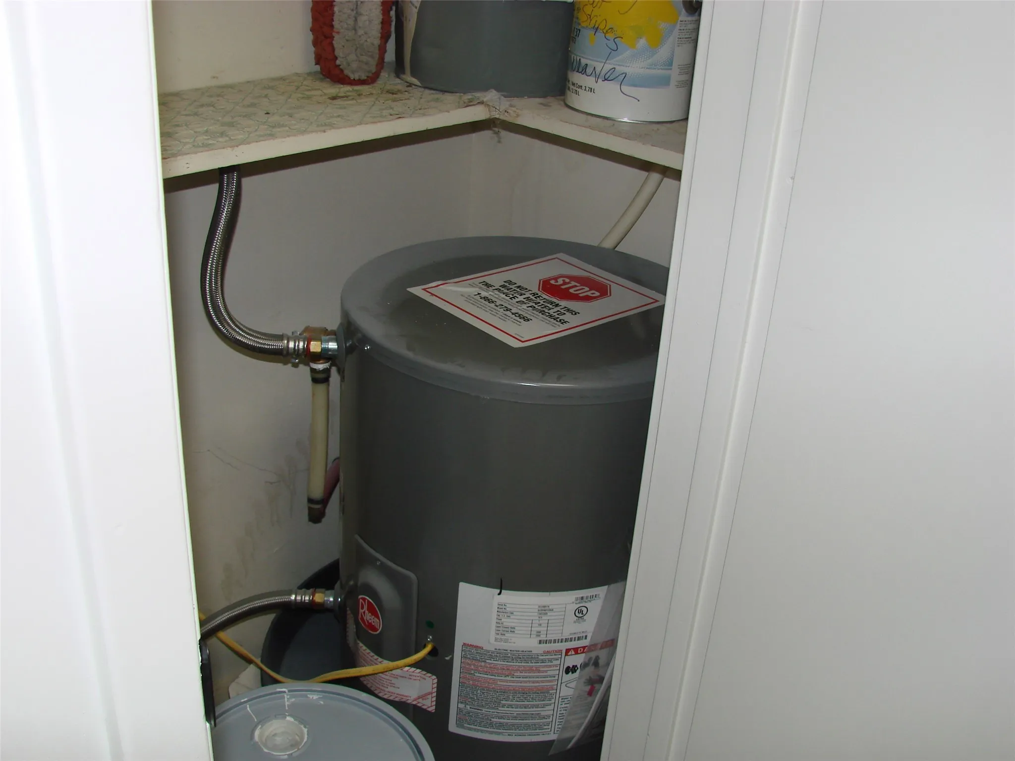 Suite A utility closet with hot water heater