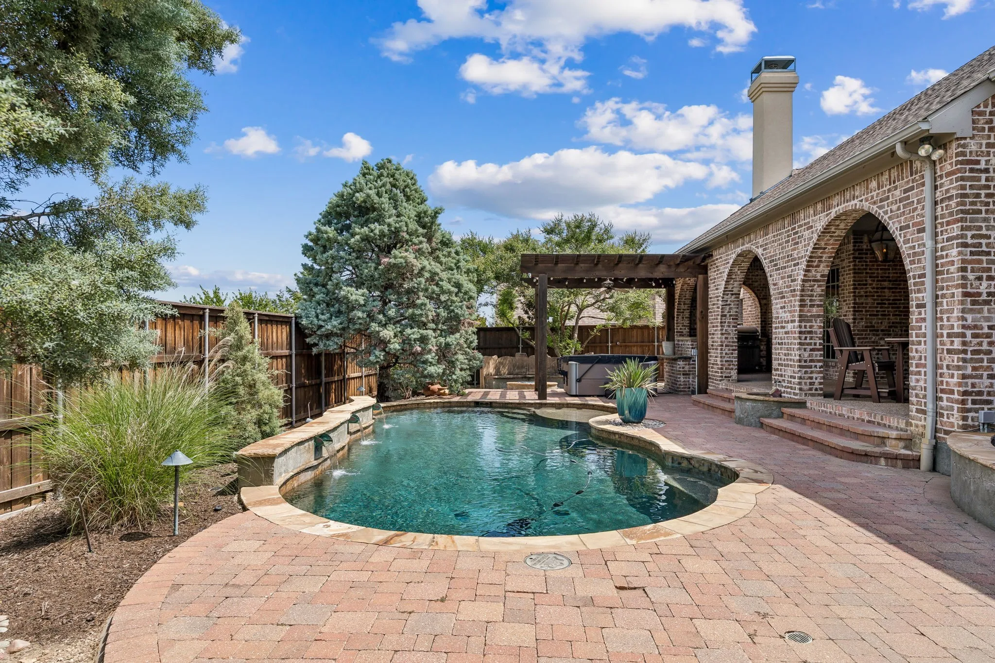 2601 Sir Castor Court features a beautiful backyard oasis.