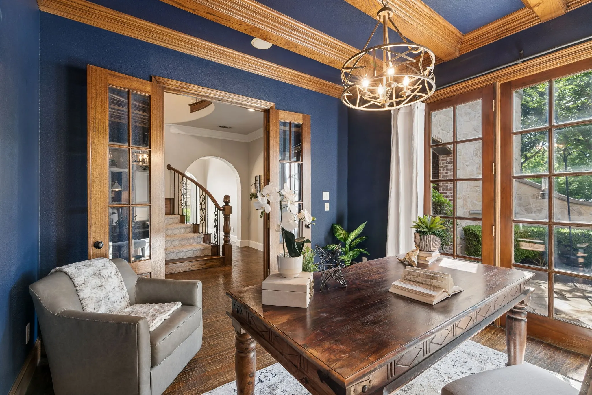 2601 Sir Castor Court boasts a private office with a coffered ceiling and a French door entry.