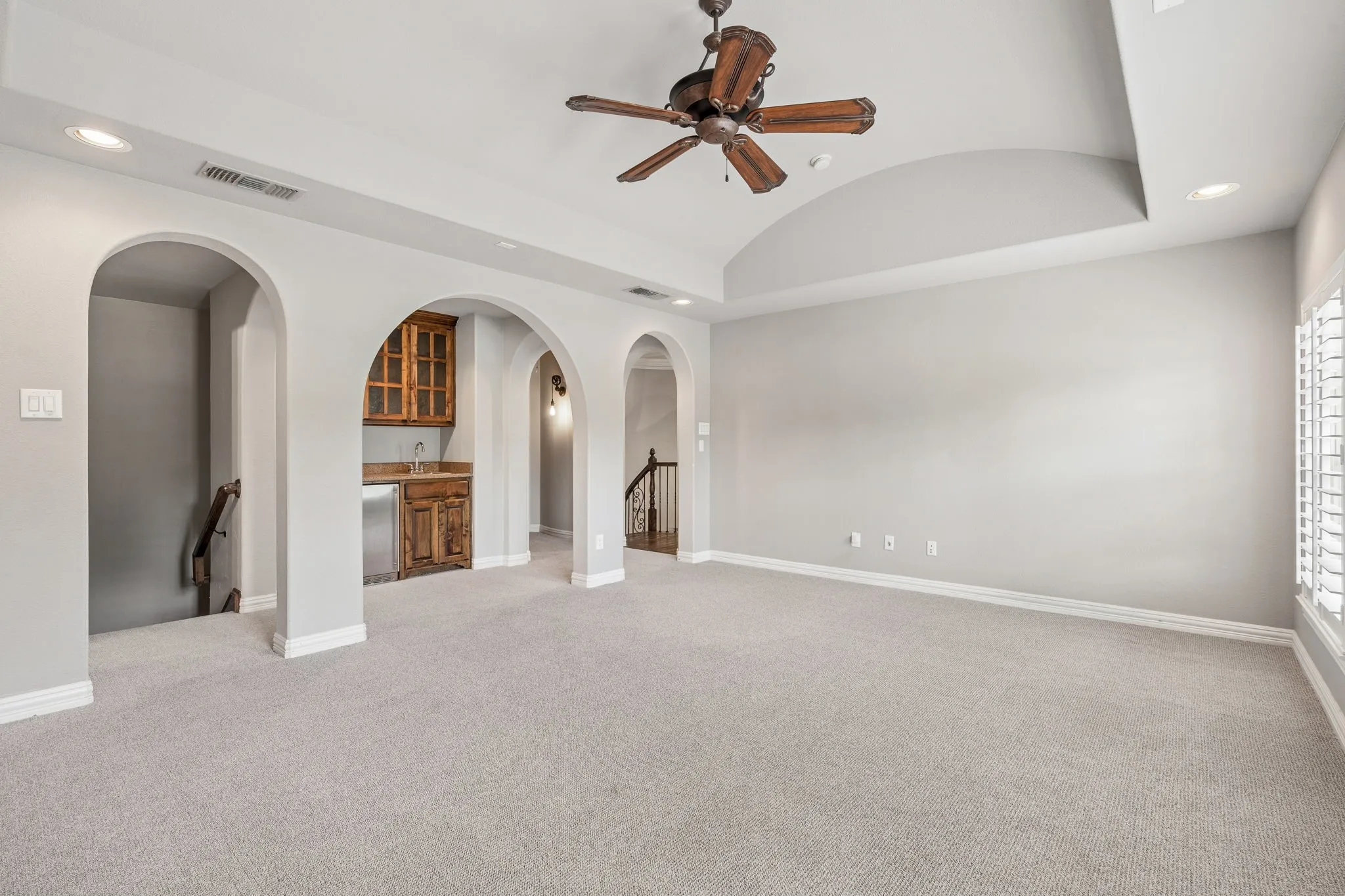 Located upstairs, the Game Room is an incredible family area that features a wet bar.