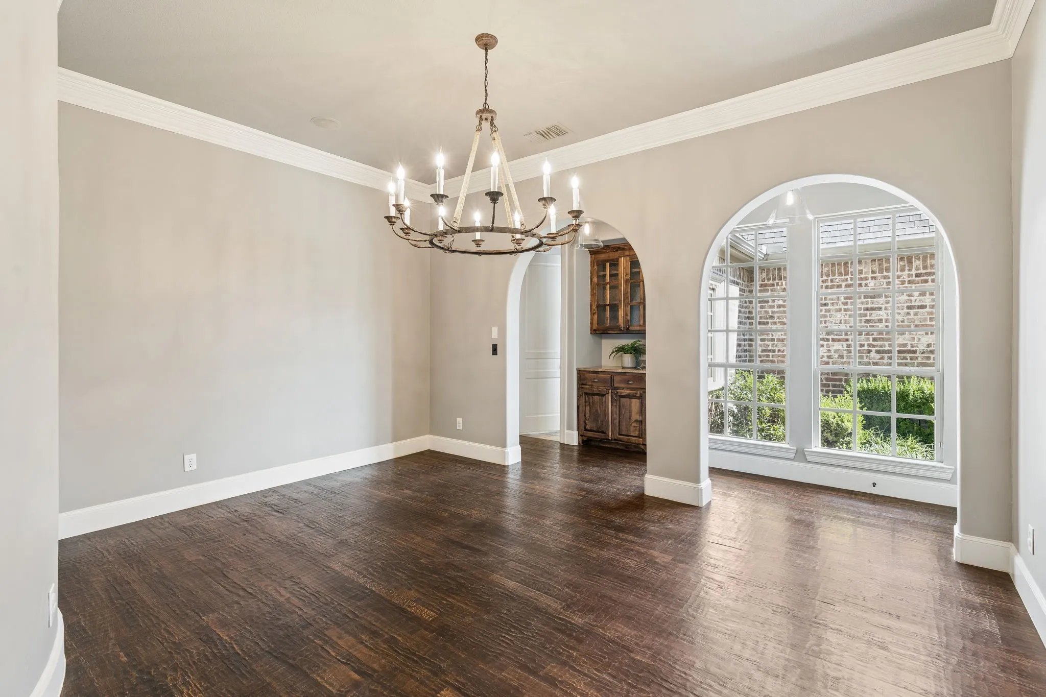 Perfect for entertaining, the formal Dining Room is open to the rest of the home.