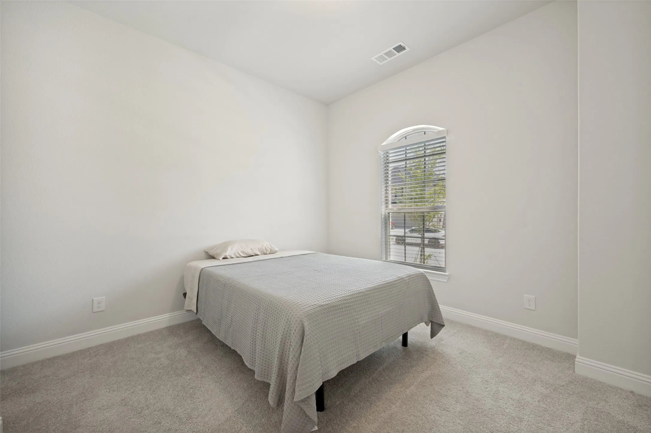 Private secondary suite with ensuite bath and attached living space—perfect for caregivers, multigenerational living, or long-term guests