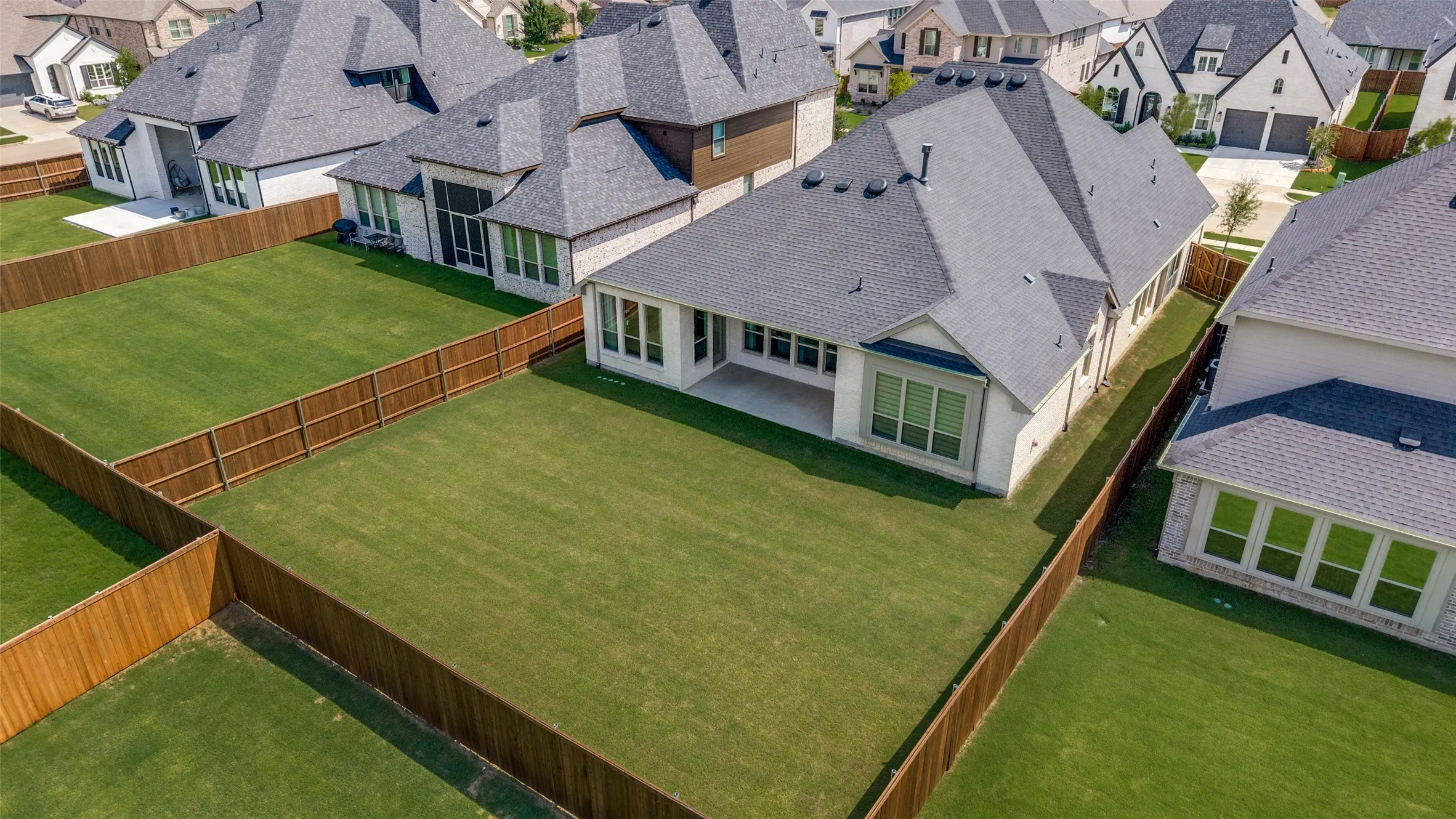 Enjoy the luxury of extra outdoor space on this premium 60-foot lot in Sandbrock Ranch. The expansive backyard offers endless possibilities for customization, from a resort-style pool to a covered outdoor living area. Combined with the home's attractive curb appeal and desirable location, this property delivers both comfort and long-term value.