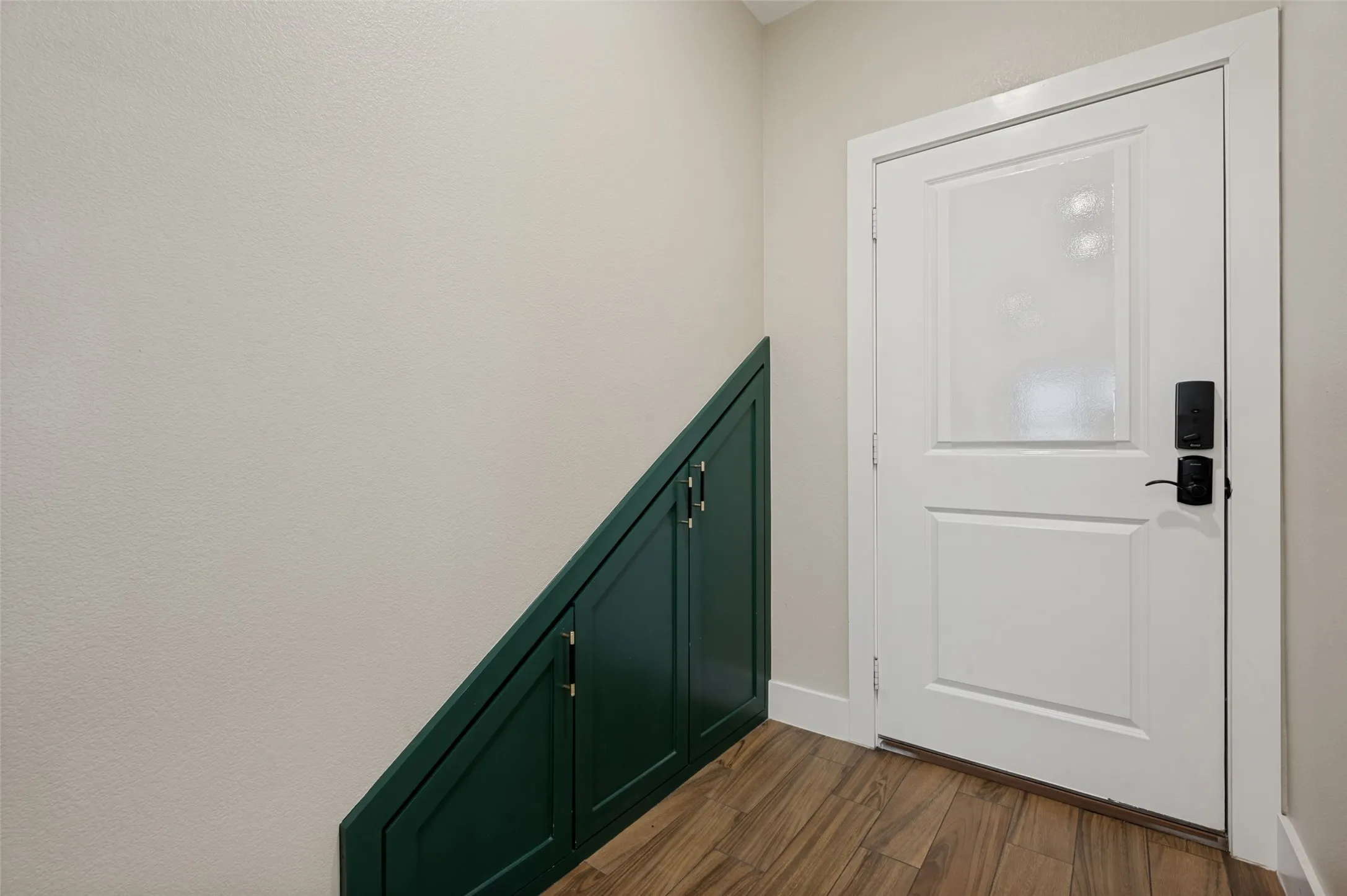 Additional storage in the in-wall cabinets in the mudroom area. This area is perfect for catching jackets, shoes, and backpacks.  It also serves as the ideal pet-room--crates, dog beds, litter boxes, etc. all fit neatly in this space.