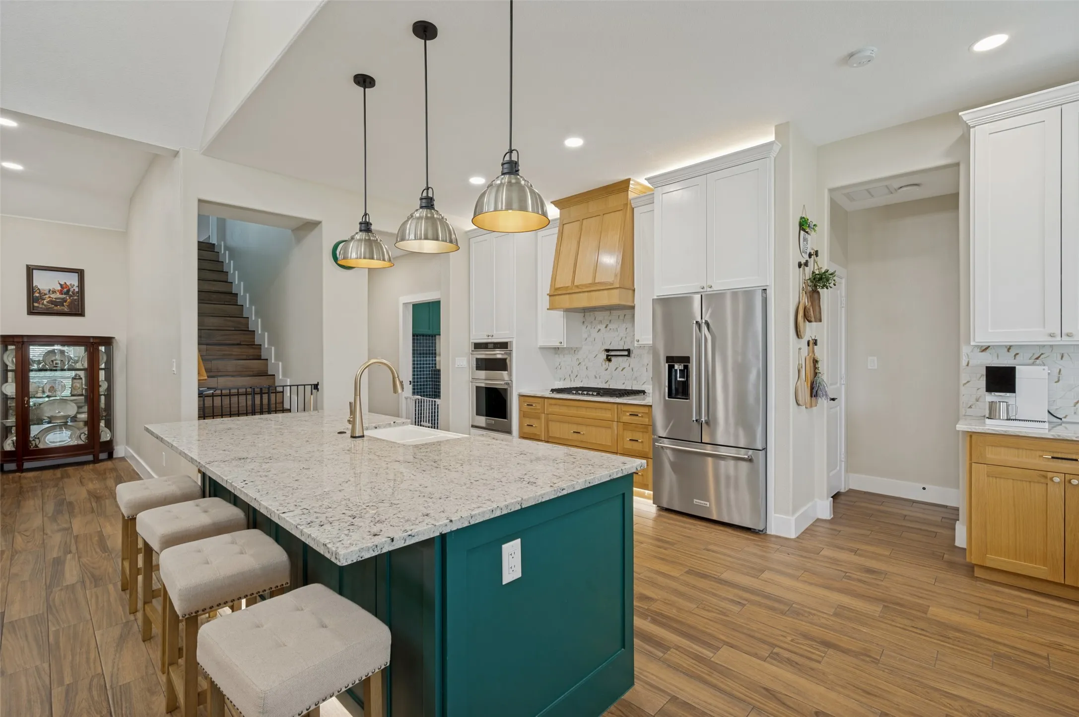 With ample space for multiple barstools and seamless flow throughout the main living areas, this kitchen is truly designed for entertaining and bringing family and friends together.