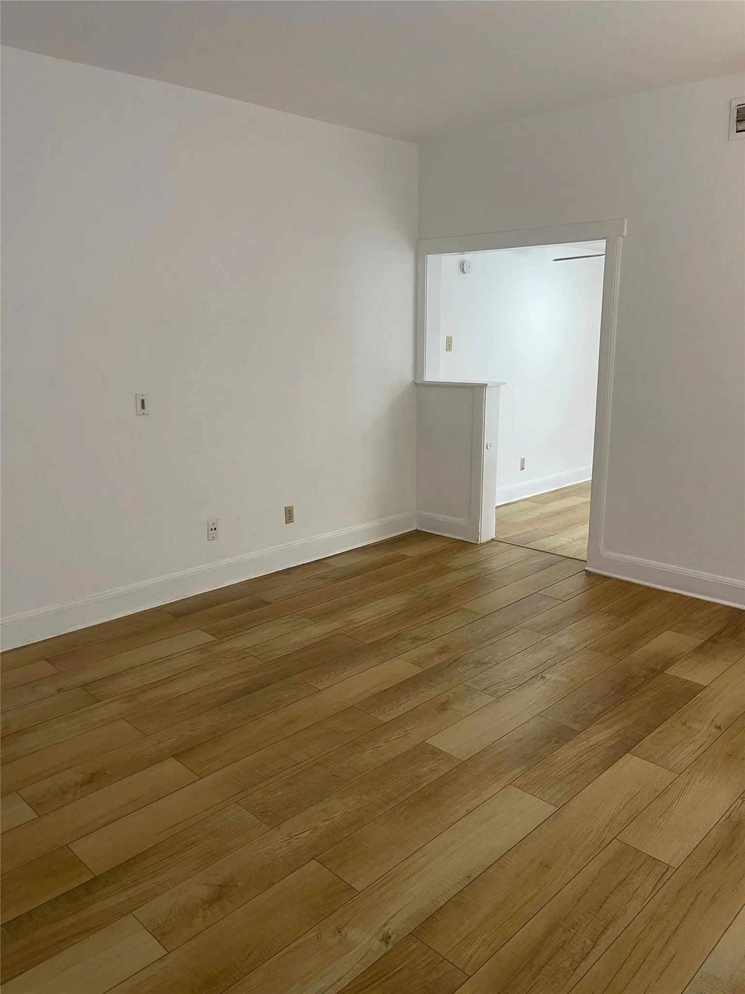 Wood-finish flooring throughout