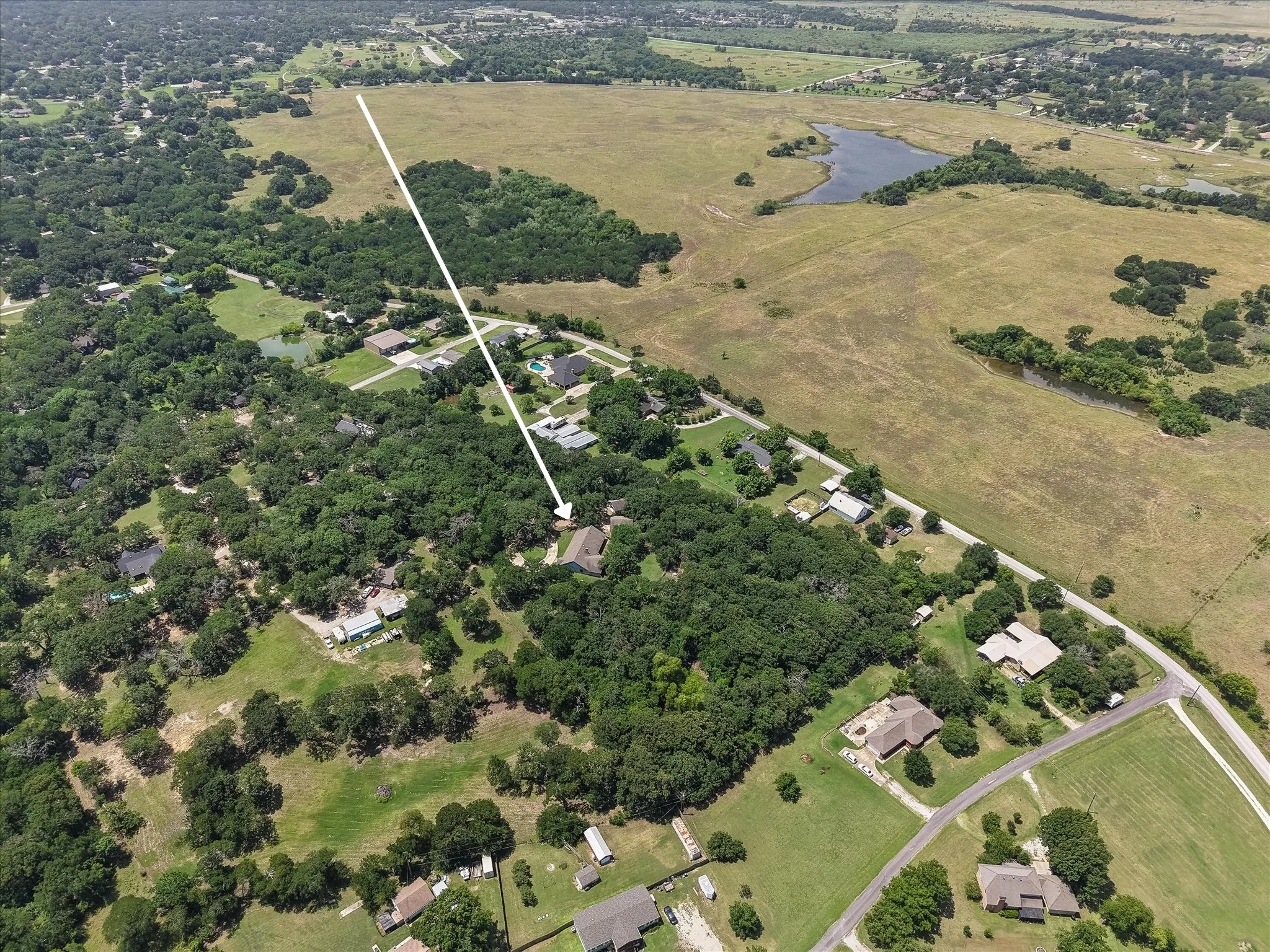 Wooded acreage setting near Dallas with room to enjoy country living, mature trees, and wide-open Texas views.