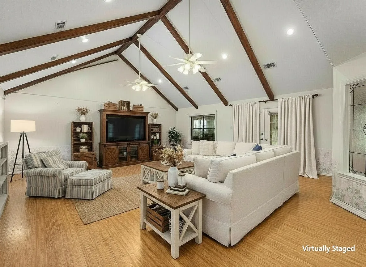 Bright flex space with built-in cabinetry overlooking the backyard.