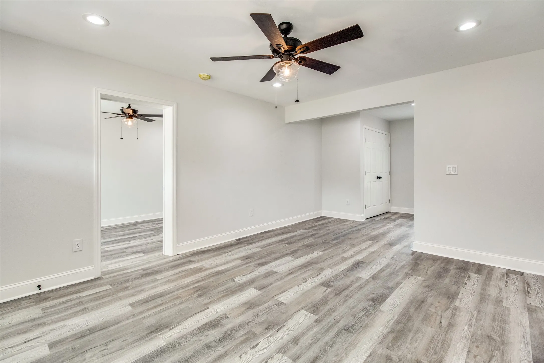 Spare room featuring light hardwood / wood-style flooring and ceiling fan