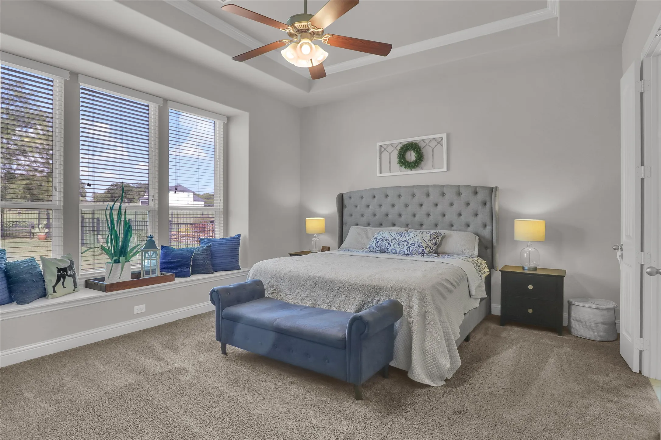 Master bedroom with view to back yard and golf course.