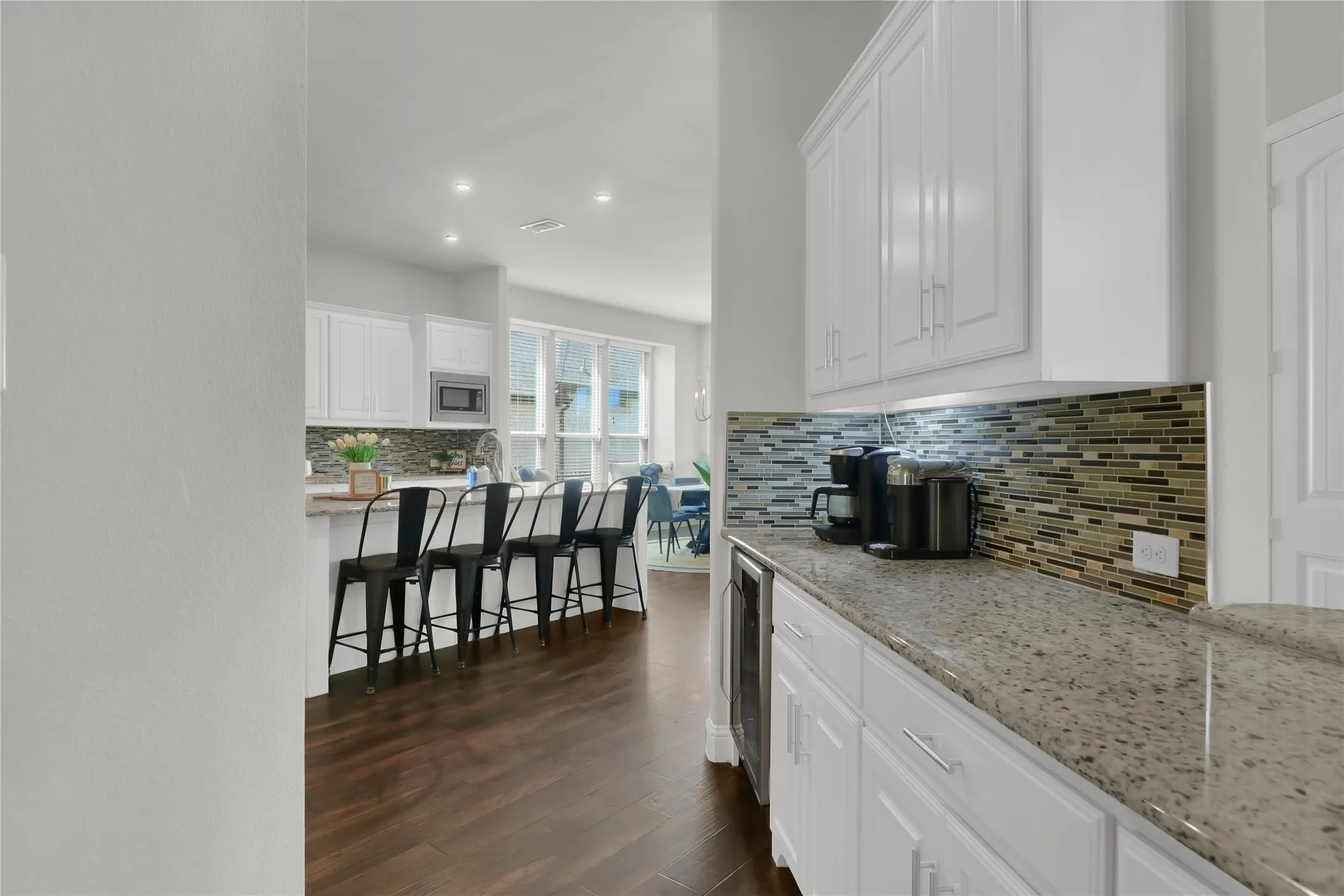 Space between kitchen and dining room adds counter space for food set up when the family and friend visit.
