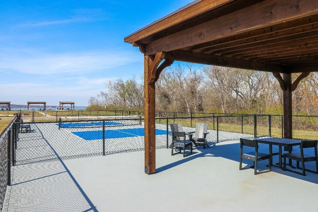 Shade to relax and watch the courts or the lake.