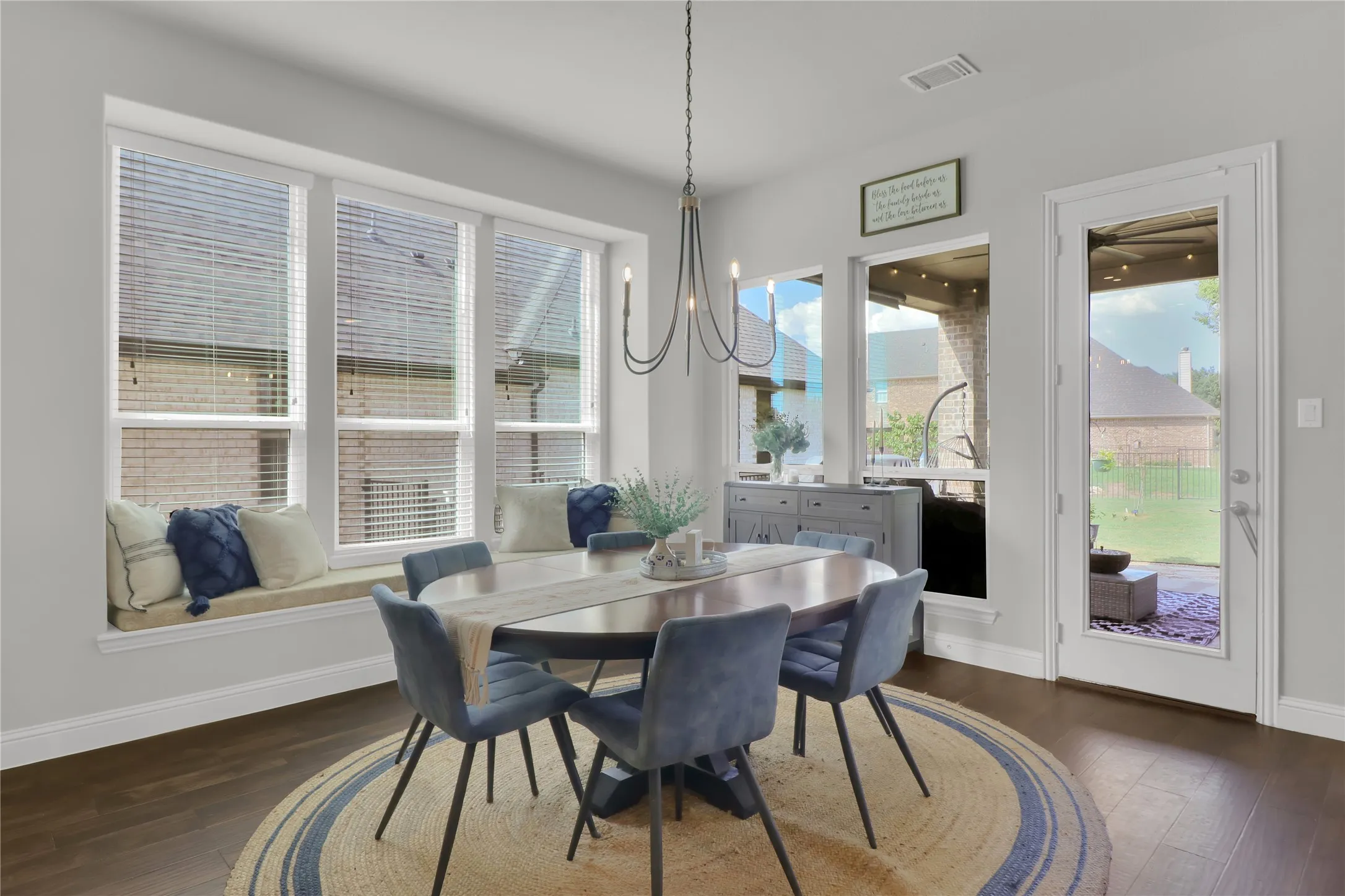 Breakfast area with door to outside. Lots of natural light and a window seat.