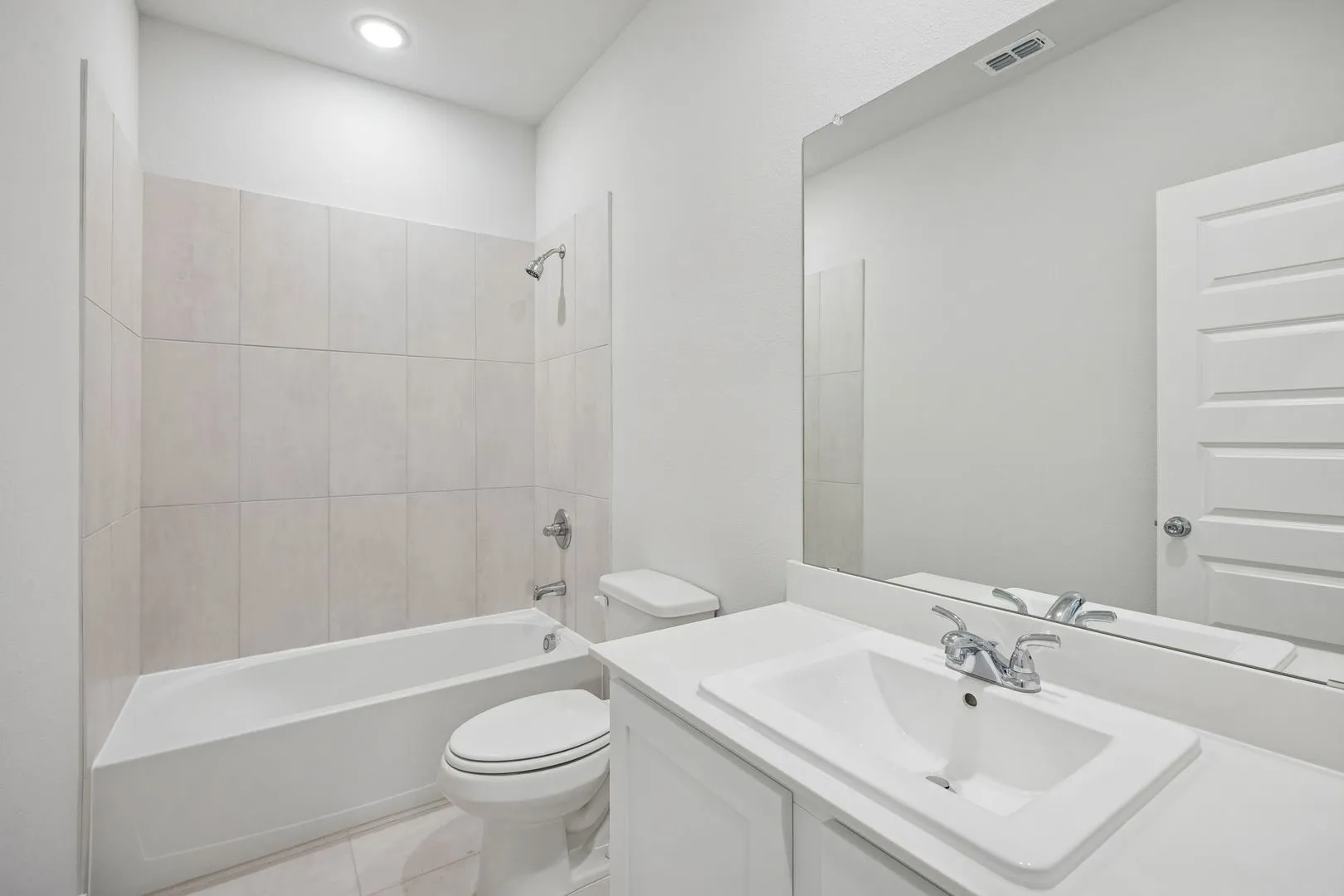 Bathroom in the Masters home plan by Trophy Signature Homes – REPRESENTATIVE PHOTO