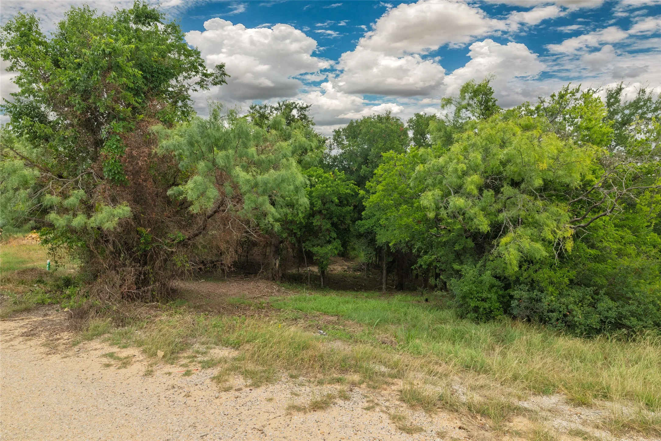 Unimproved Land For Sale in Wise County , TBD Lanai Circle, Runaway Bay, Texas 76426, 0, 0, Garage spaces, 0 Sqft, built in 0, Price $22,000, mls#21297581, Real Estate Agent in Runaway Bay, Homes For Sale in Wise county, Homes For Sale in Runaway Bay, Realtor in Runaway Bay Texas, Real Estate Brokerage Independent Realty Texas, Luminita Cordes Realtor