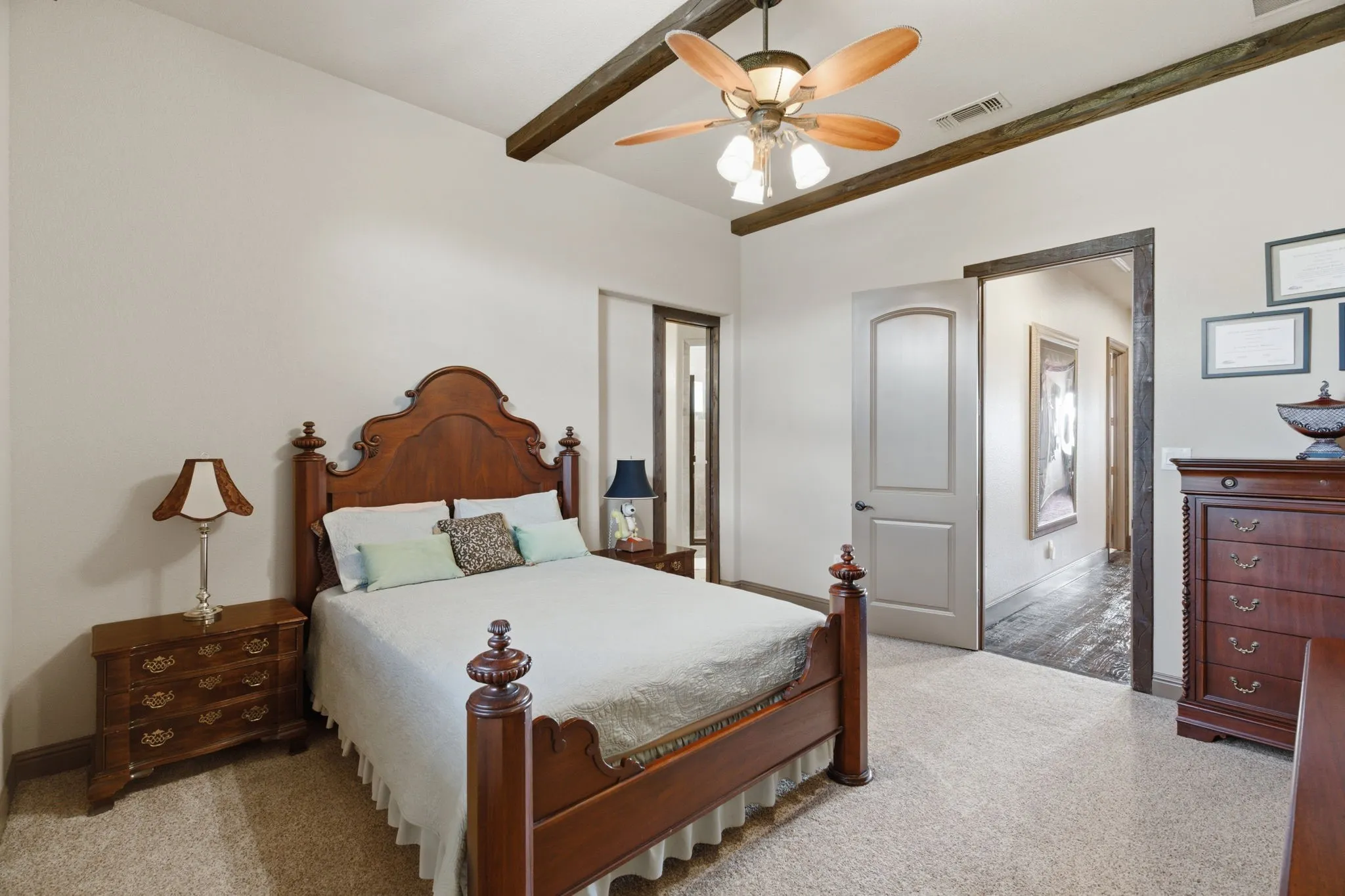 Upstairs bedroom 3 Light-colored wall finishes complementing a textured carpet flooring