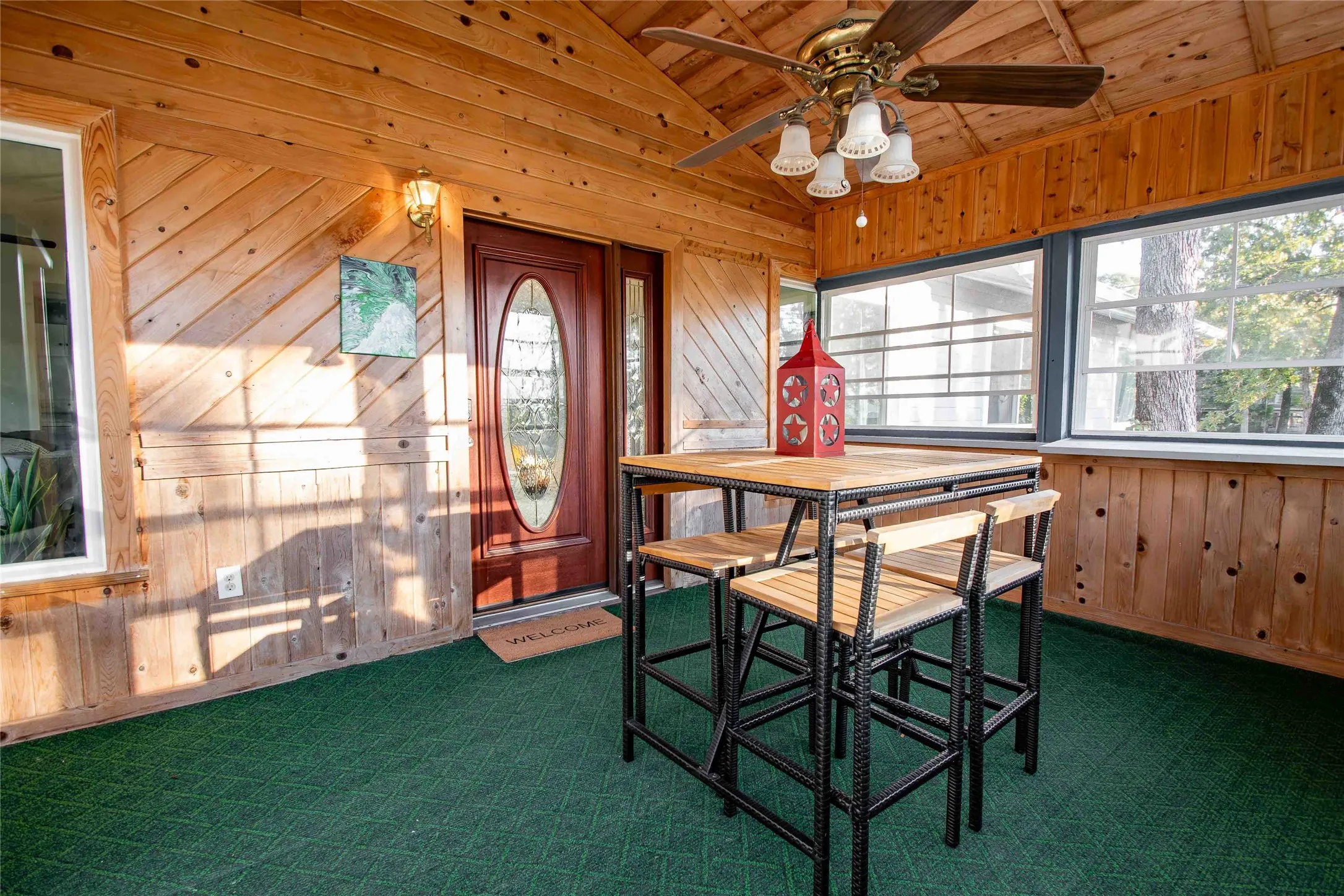 screened in front porch leading into front door