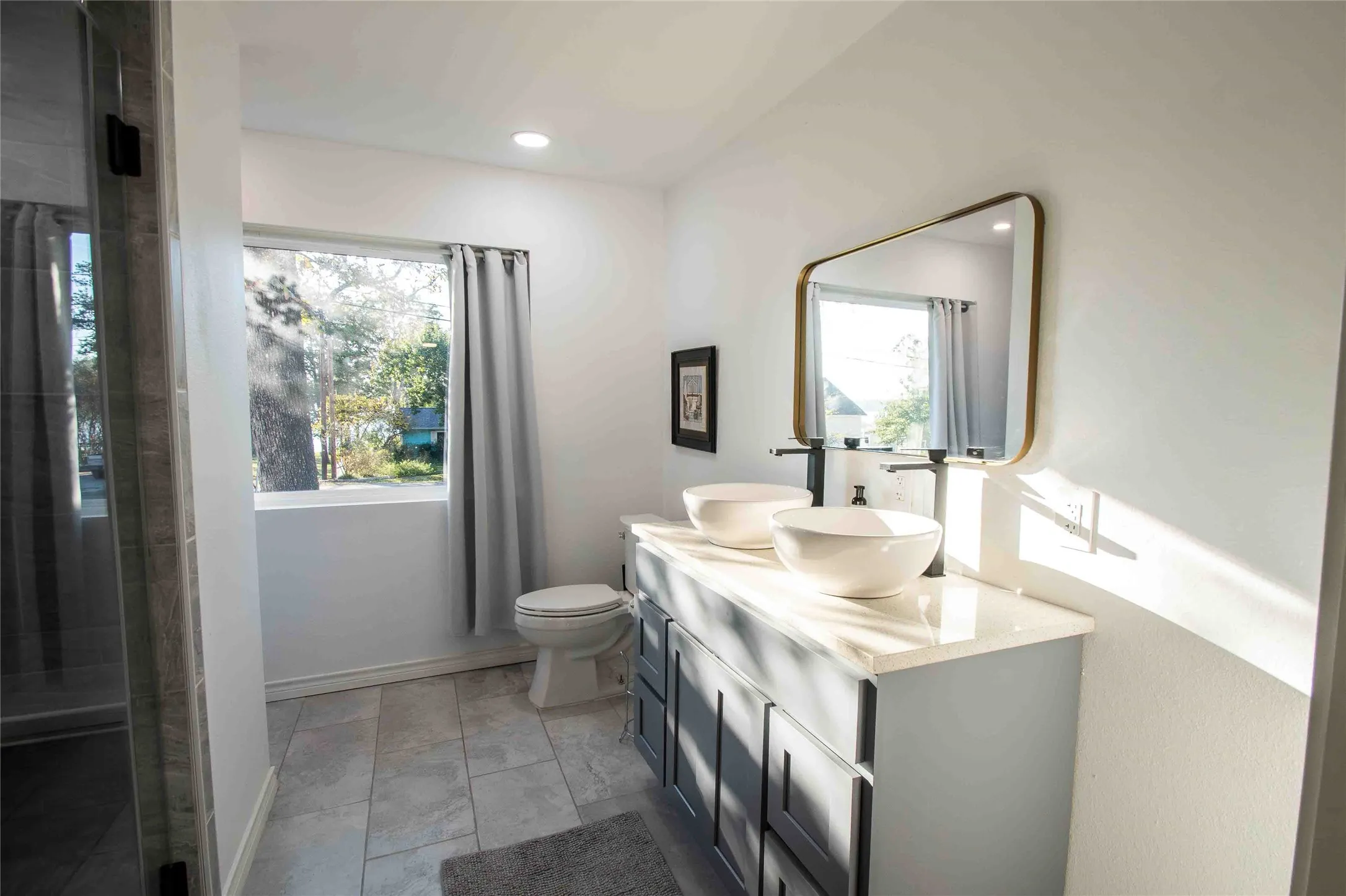 master bath with view of lake