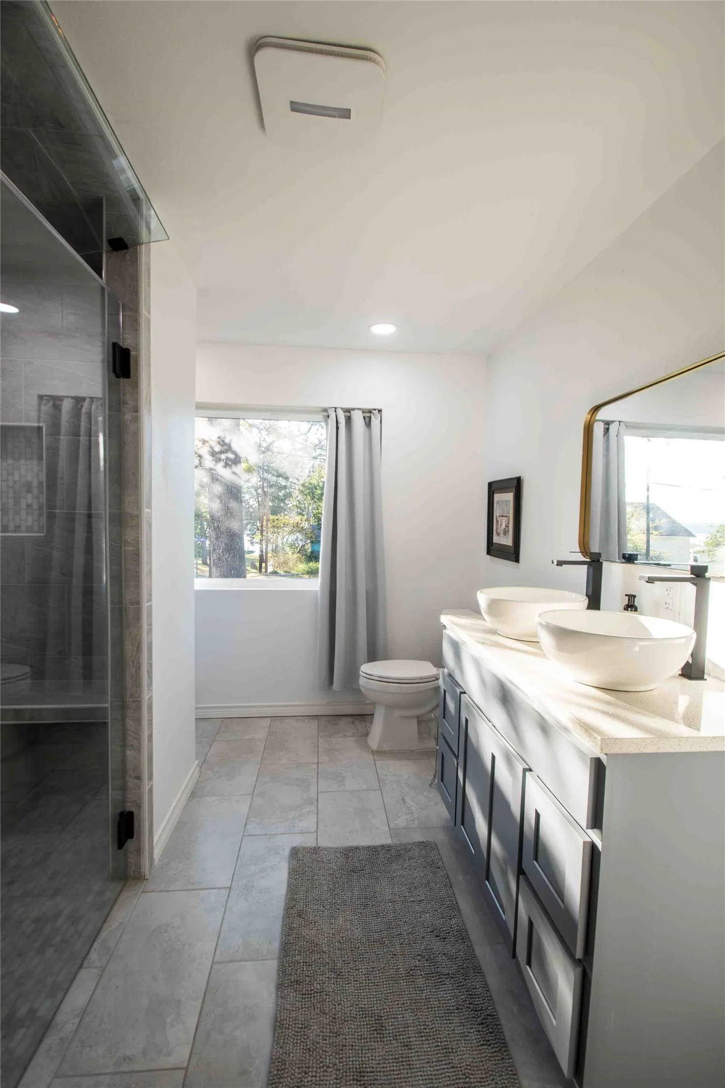 master bath with dual sinks