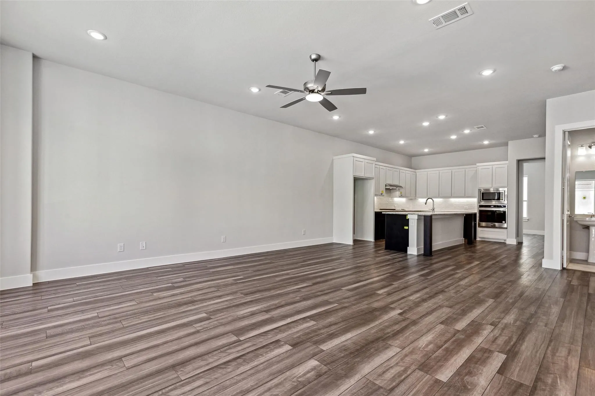 OPEN CONCEPT  FROM LEVEL TWO LIVING AREA  TO GOURMET KITCHEN
