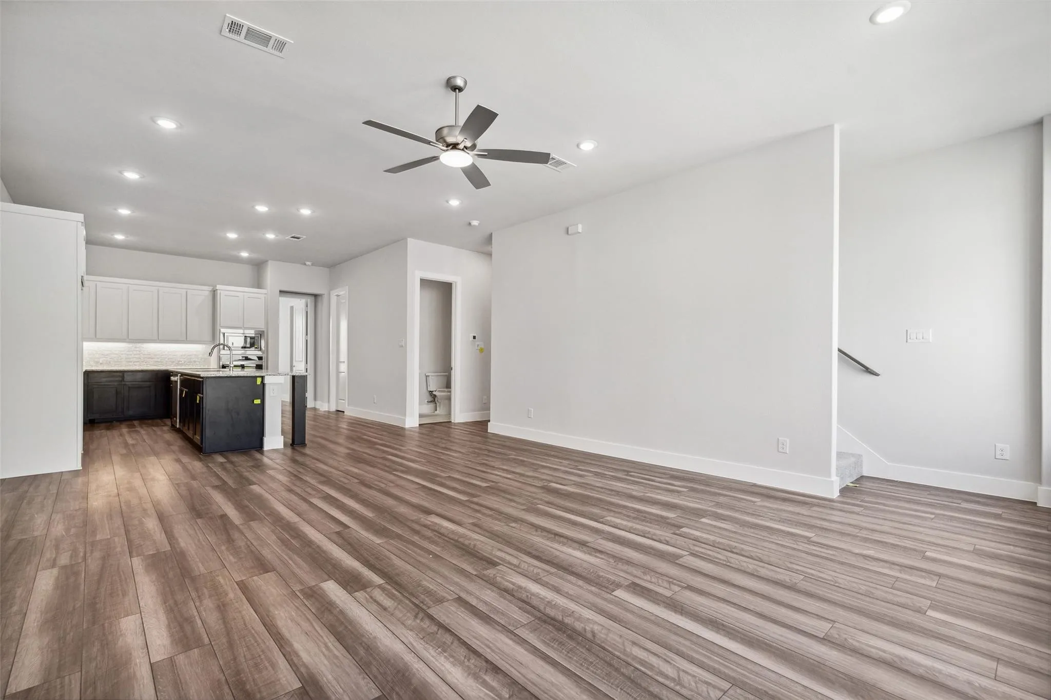 HALF BATH ADJACENT TO LIVING AREA ON LEVEL TWO