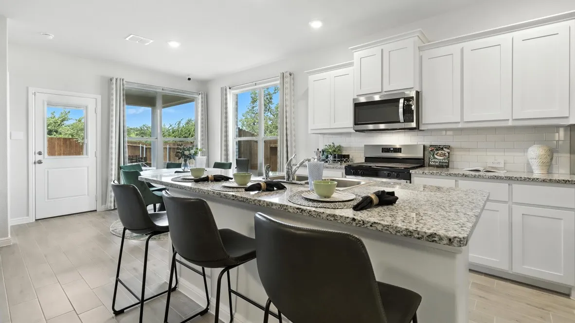 Kitchen - All Home and community information, including pricing, included features, terms, availability and amenities, are subject to change at any time without notice or obligation. All Drawings, pictures, photographs, video, square footages, floor plans, elevations, features, colors and sizes are approximate for illustration purposes only and will vary from the homes as built.
