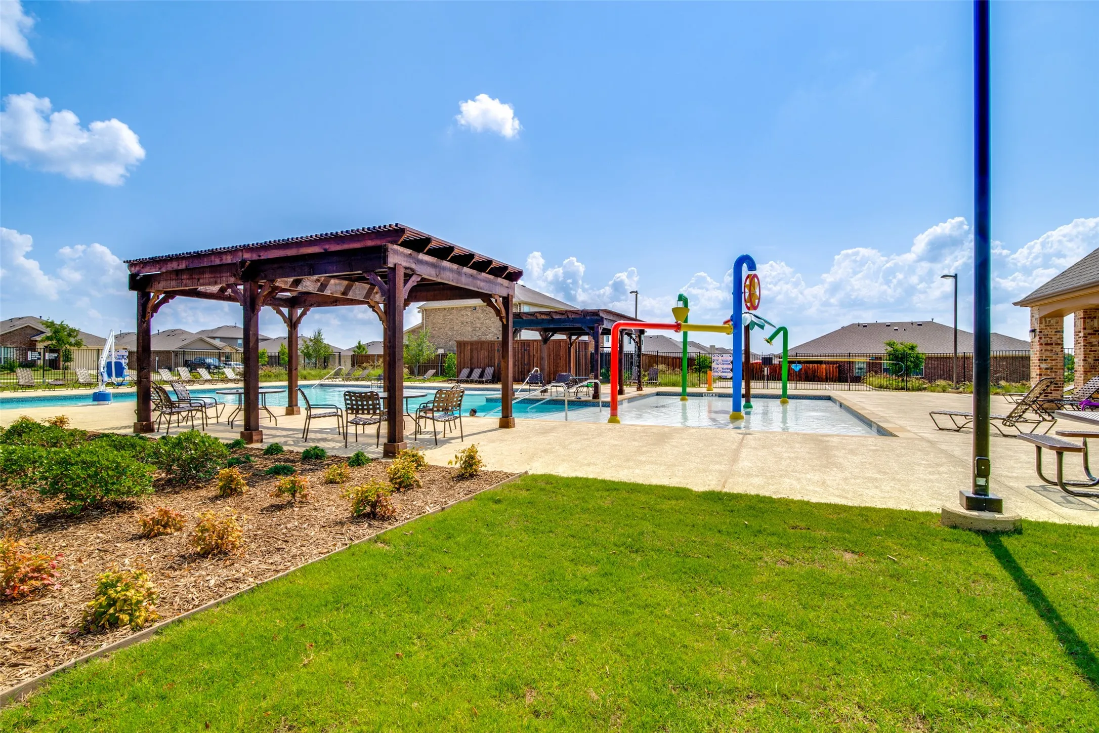 Community pool with splash pad