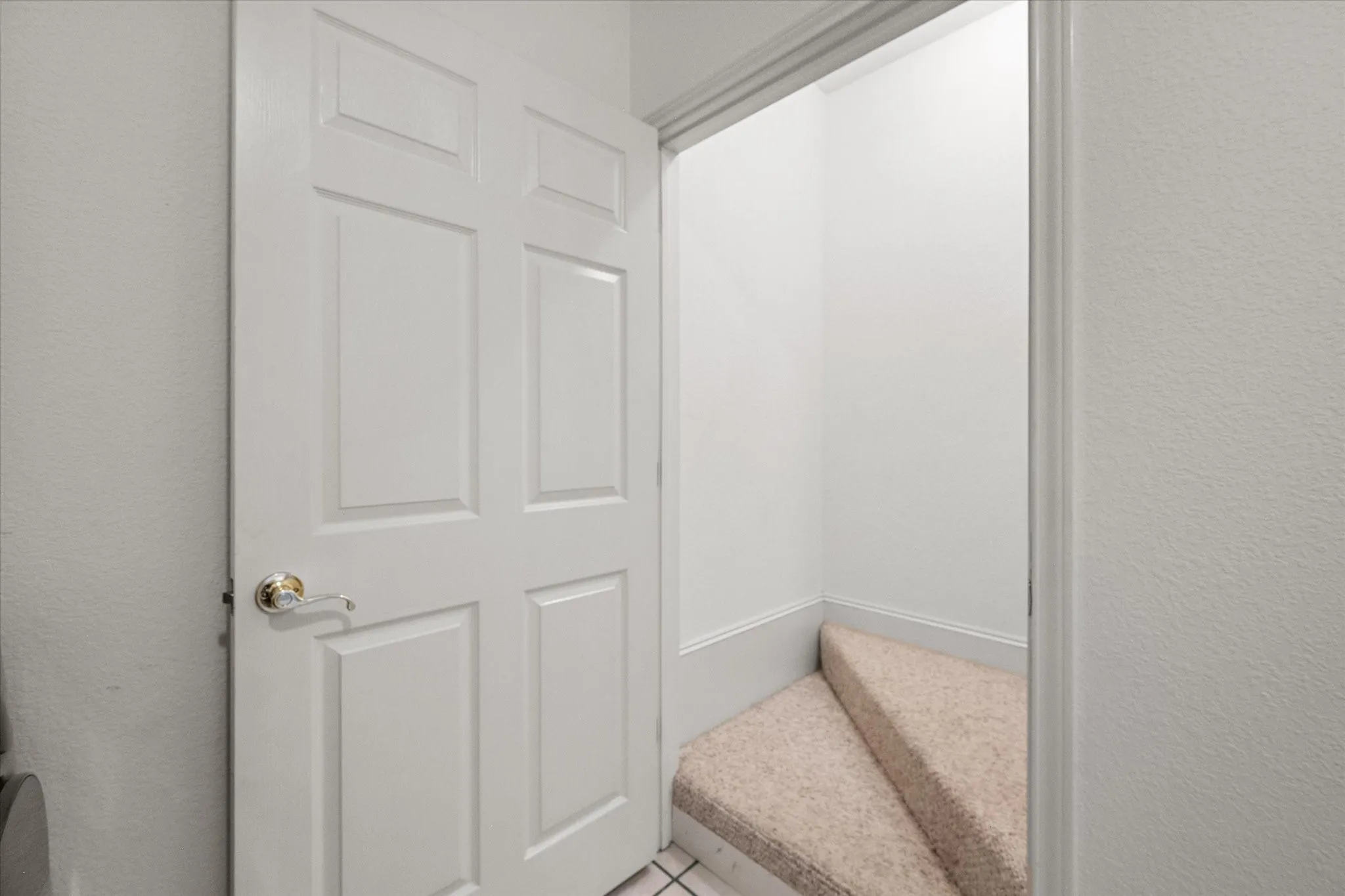 Built-in stairway access near Dallas leading to a large upstairs bonus room for extra flexible space.