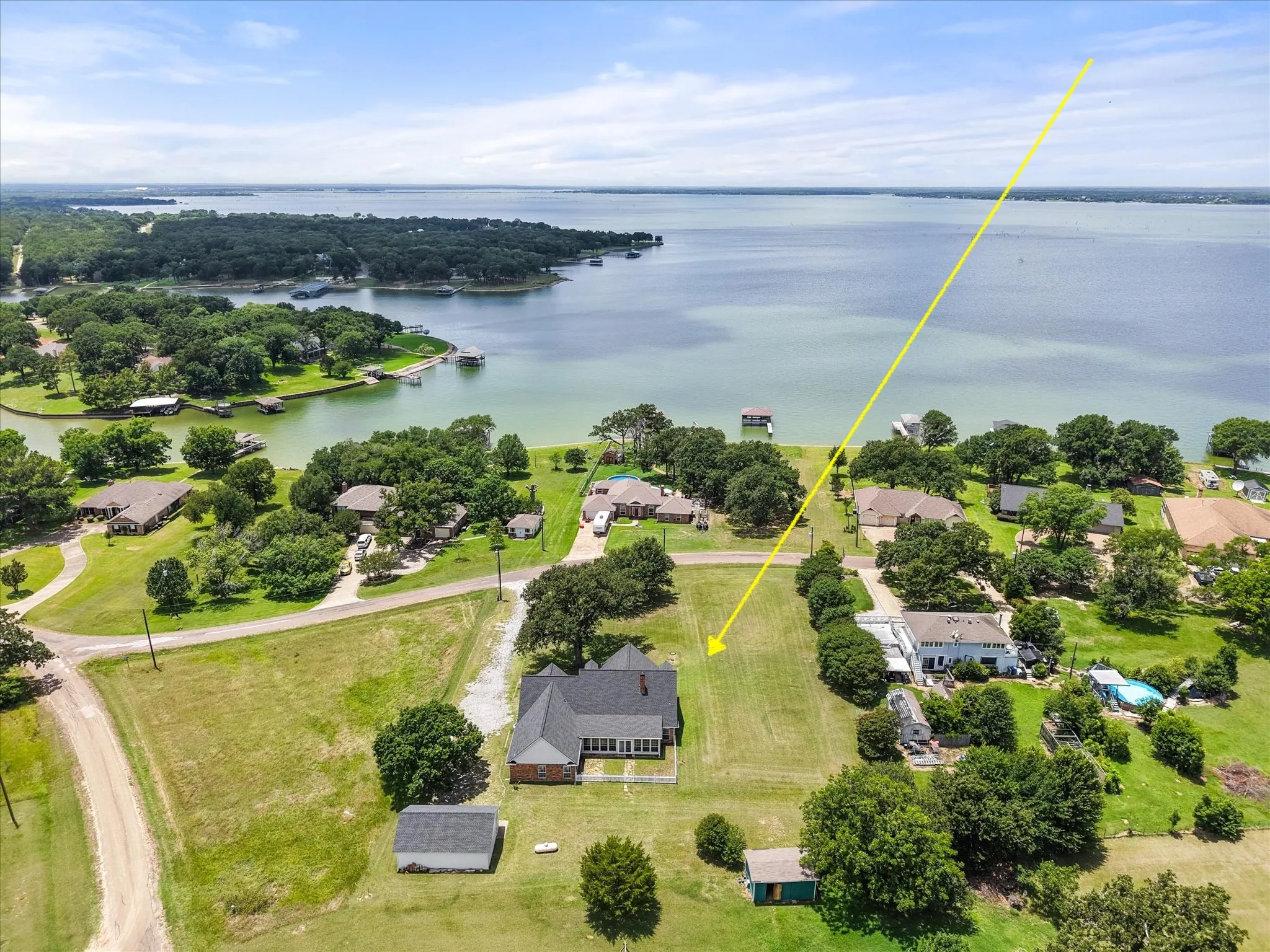 Aerial lake proximity in Streetman, TX showing the home’s location within Rustling Oaks Estates.