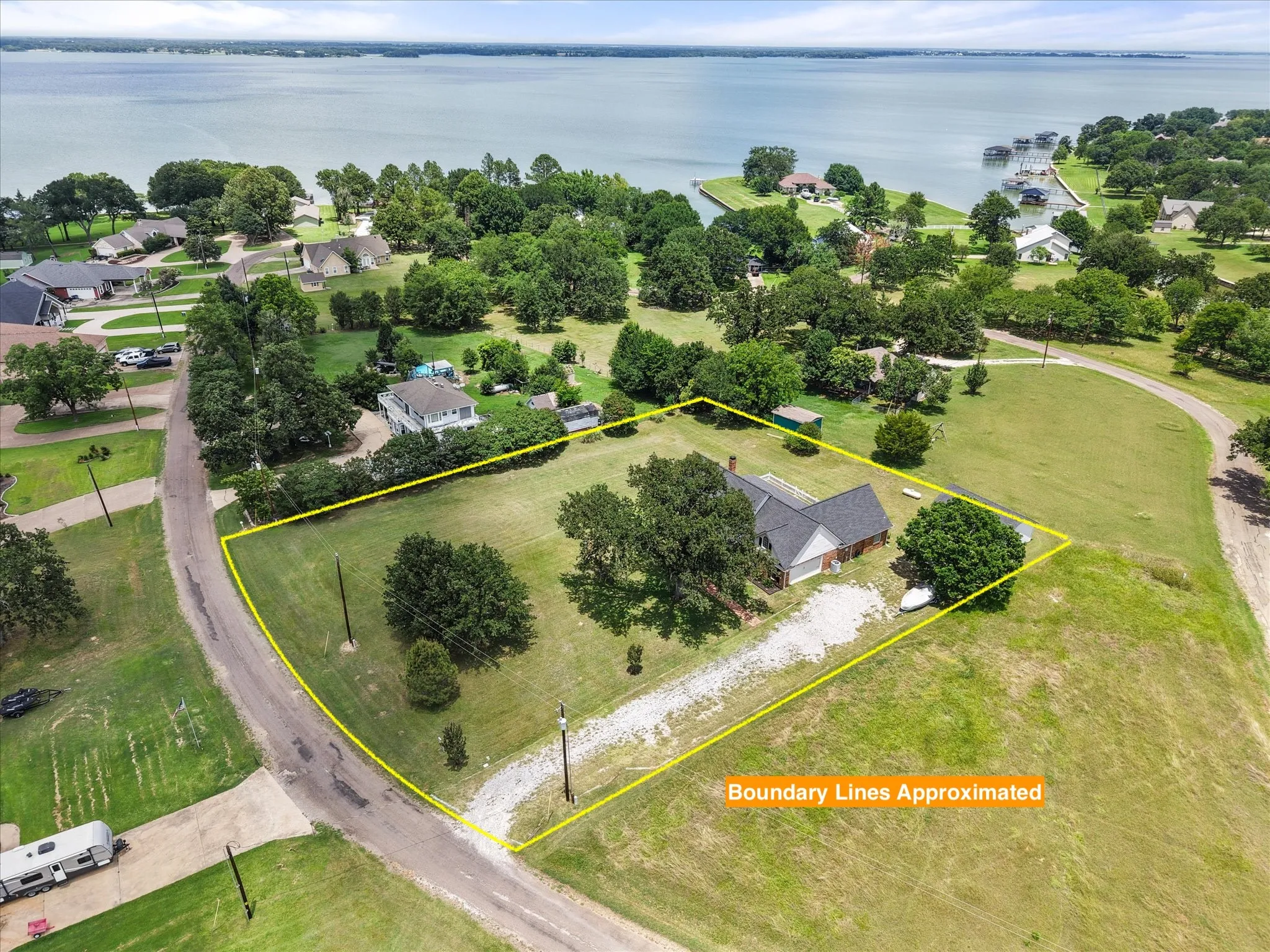 Aerial view near Richland Chambers Lake highlighting the spacious 1-acre setting and nearby lake neighborhood.
