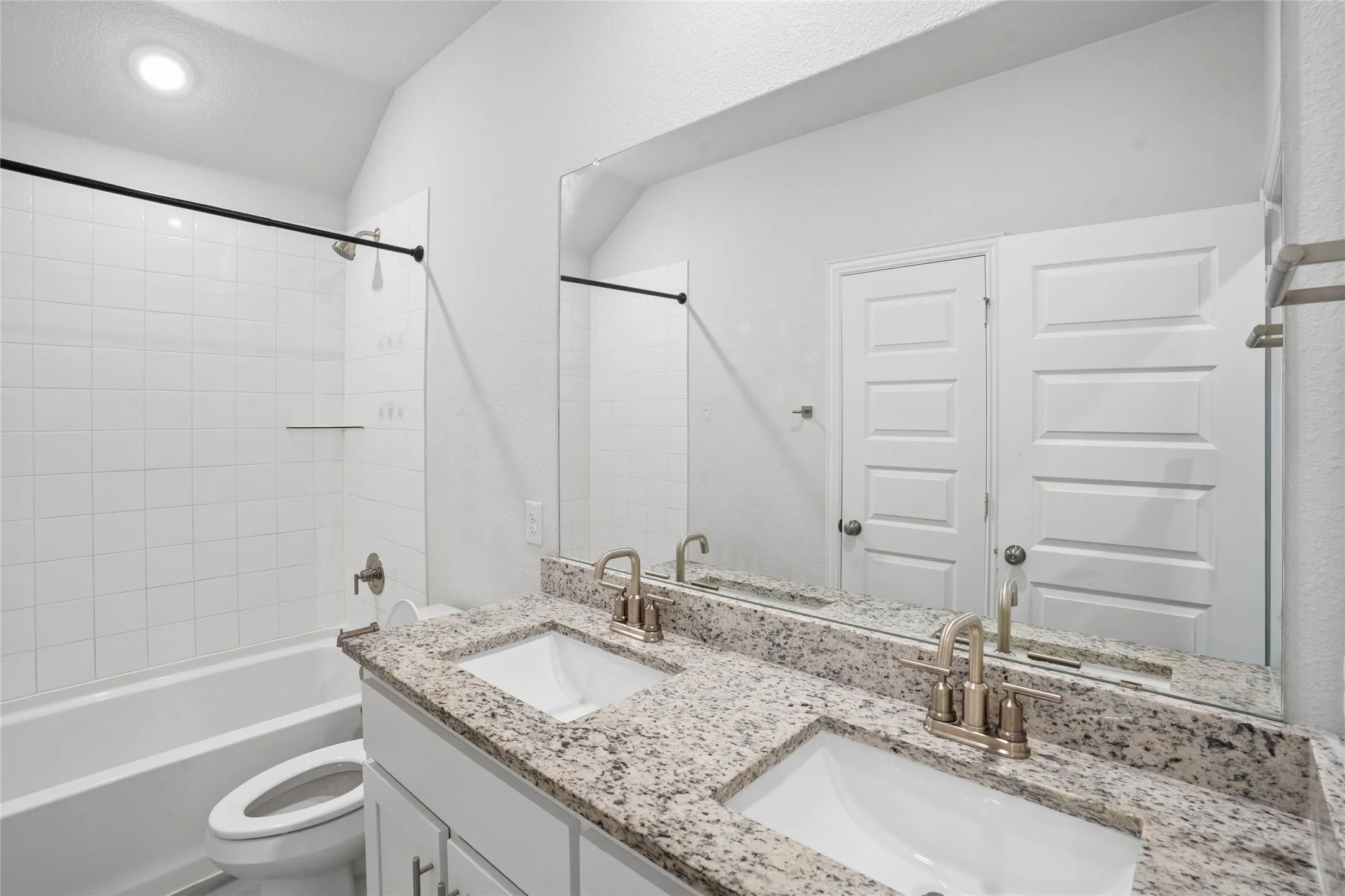 Dual vanity with granite countertop and undermount sinks
