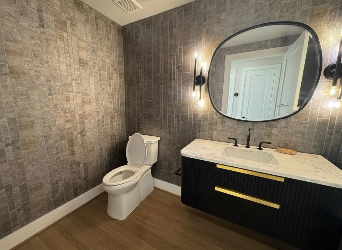Half Bath off the Foyer.
