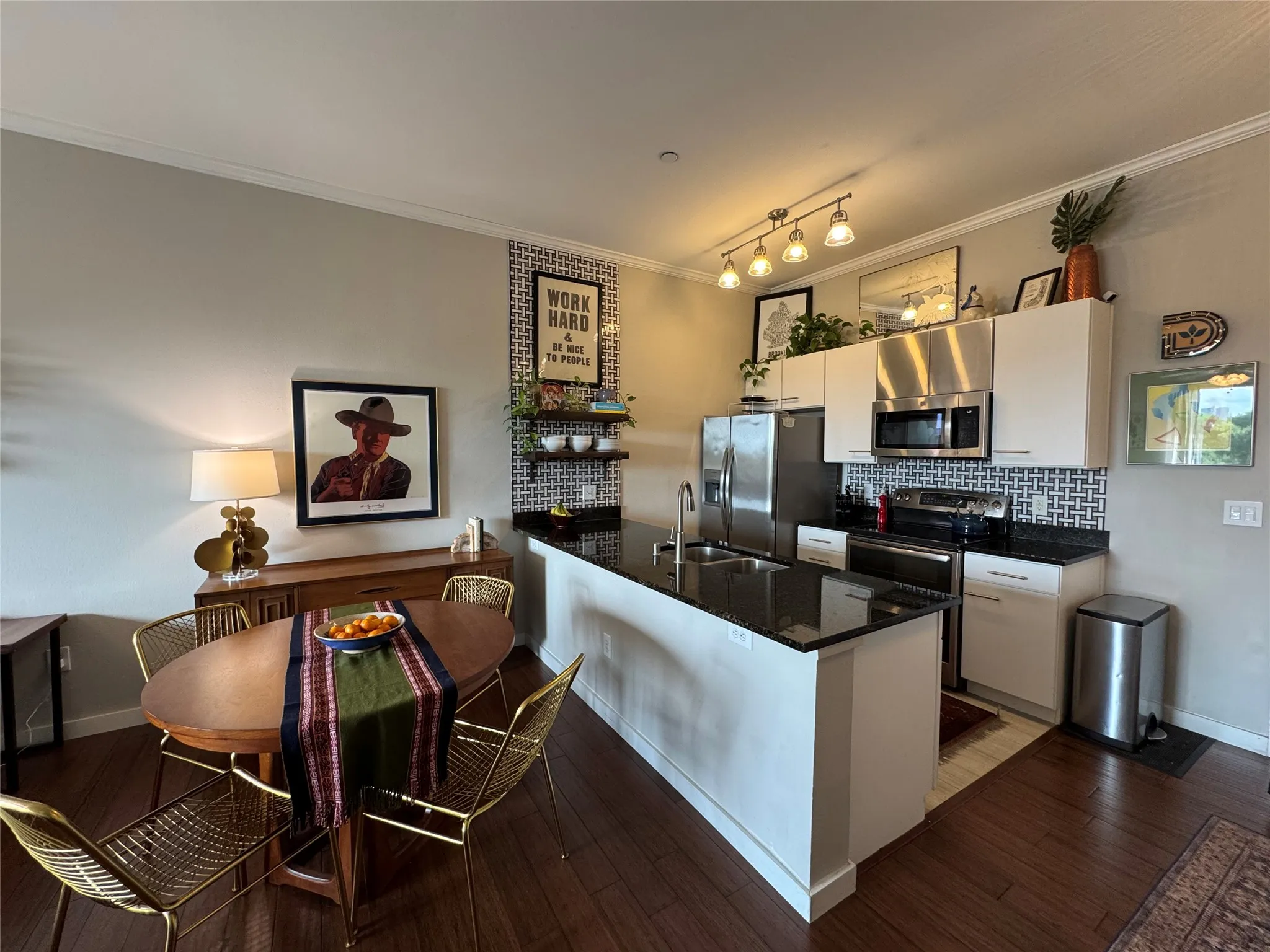 The kitchen is open to the dining and living area