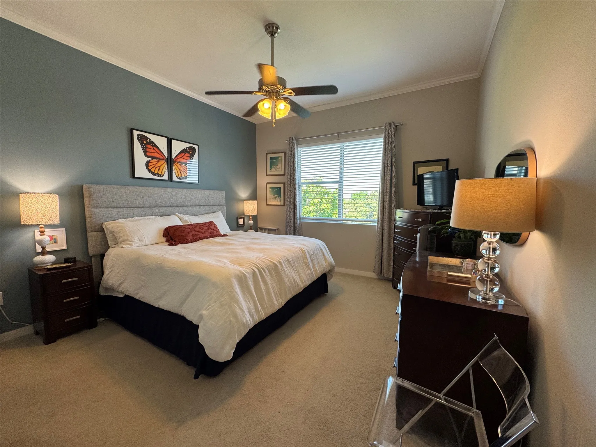 Spacious primary bedroom with space for a king size bed