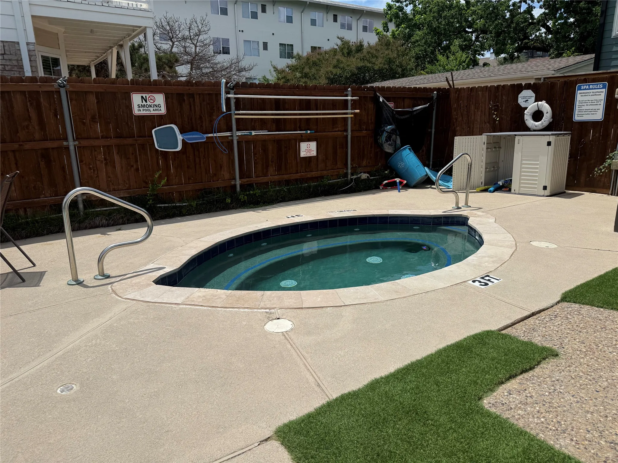 The community pool includes a spa, clubhouse, patio area, and grill.