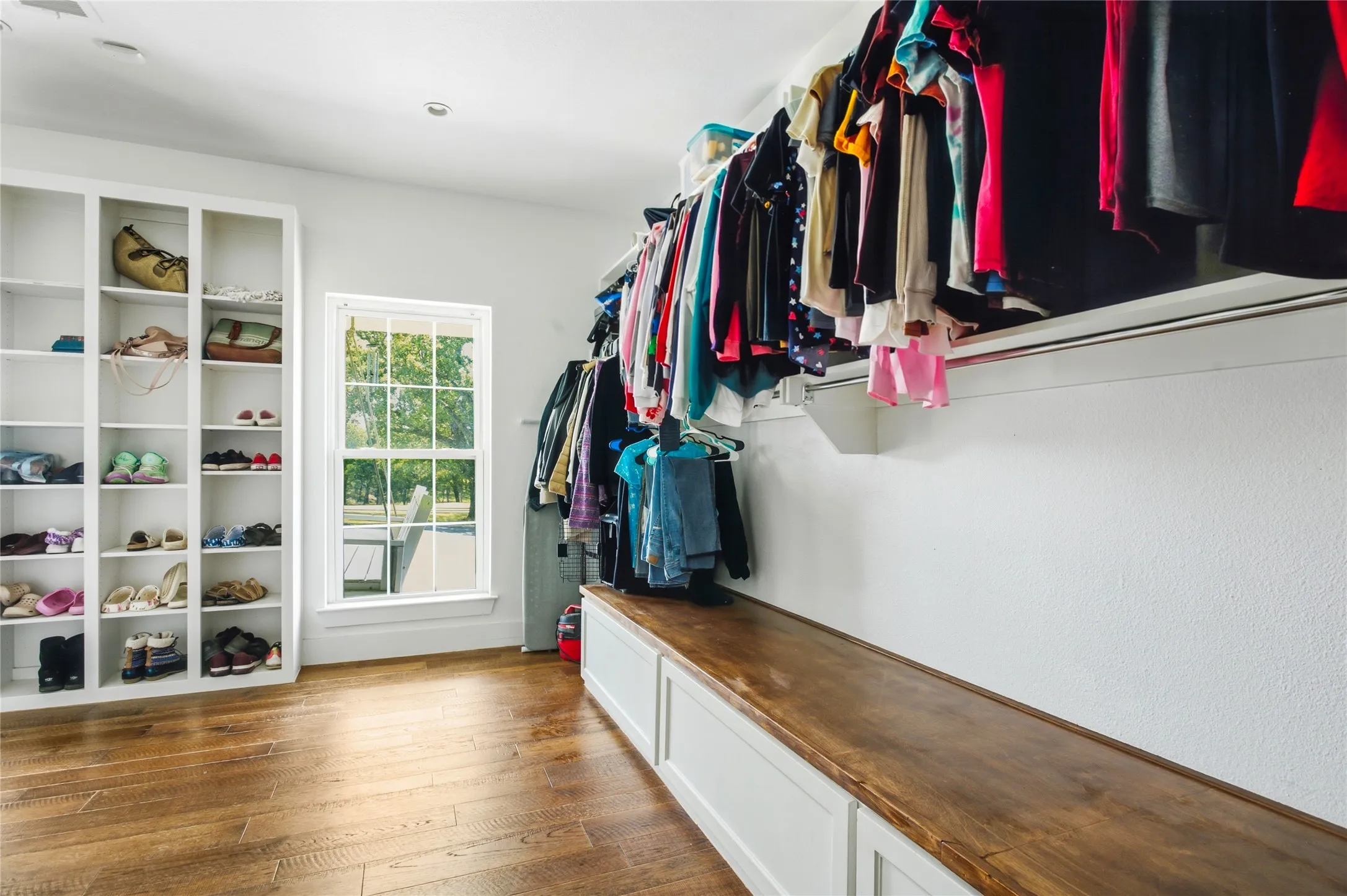 Everyone wants more room in the closet... this room has it!!  Plenty of room for hanging clothes, a large cabinet with drawers for storage and a tall & wide shelf for shoes and folded clothes.  But wait, there's more...