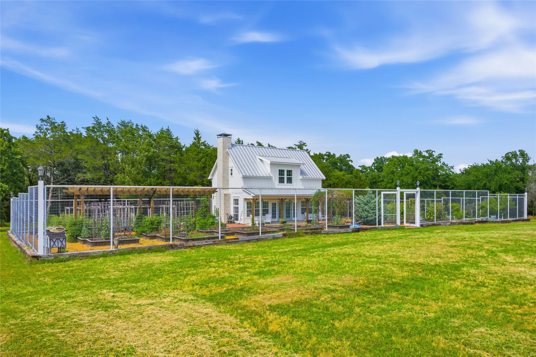 A bonus you didn't see coming --- a garden area with a charming two-story garden house!  Could it be a guest house? All it needs would be a stove and a refrigerator downstairs and a shower in the upstairs bath!  Make it your own!
