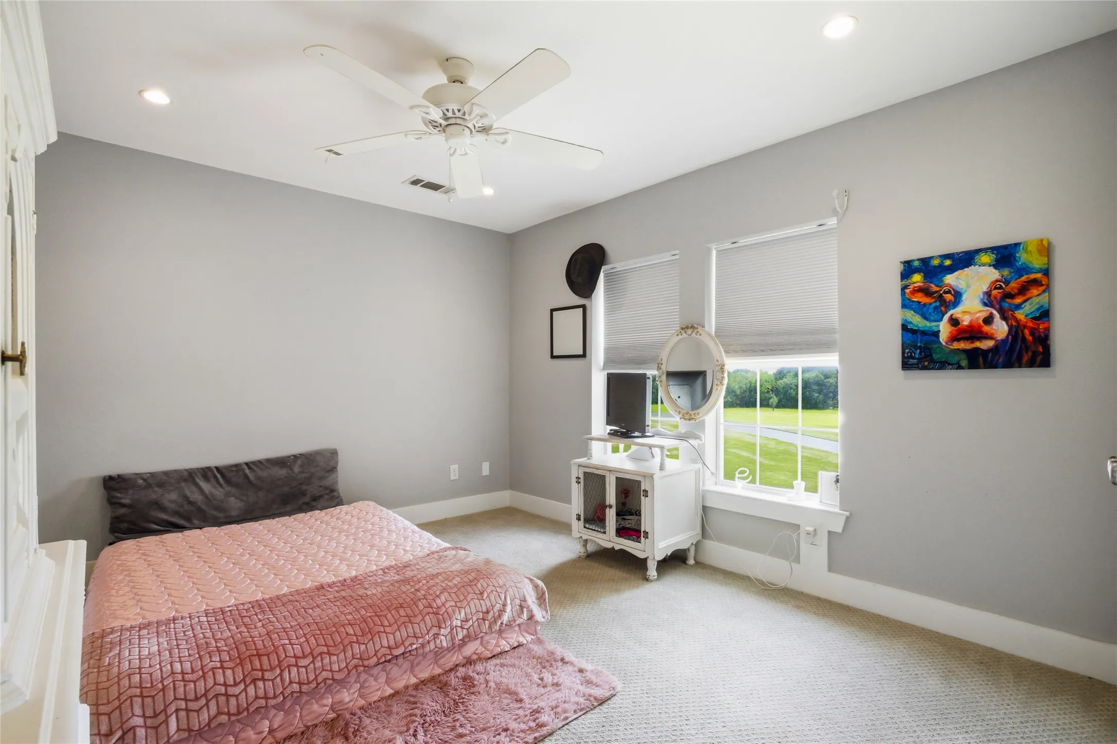 Three upstairs bedrooms make room for family or guests.  Each has a view of the beautiful landscape and/or pond.