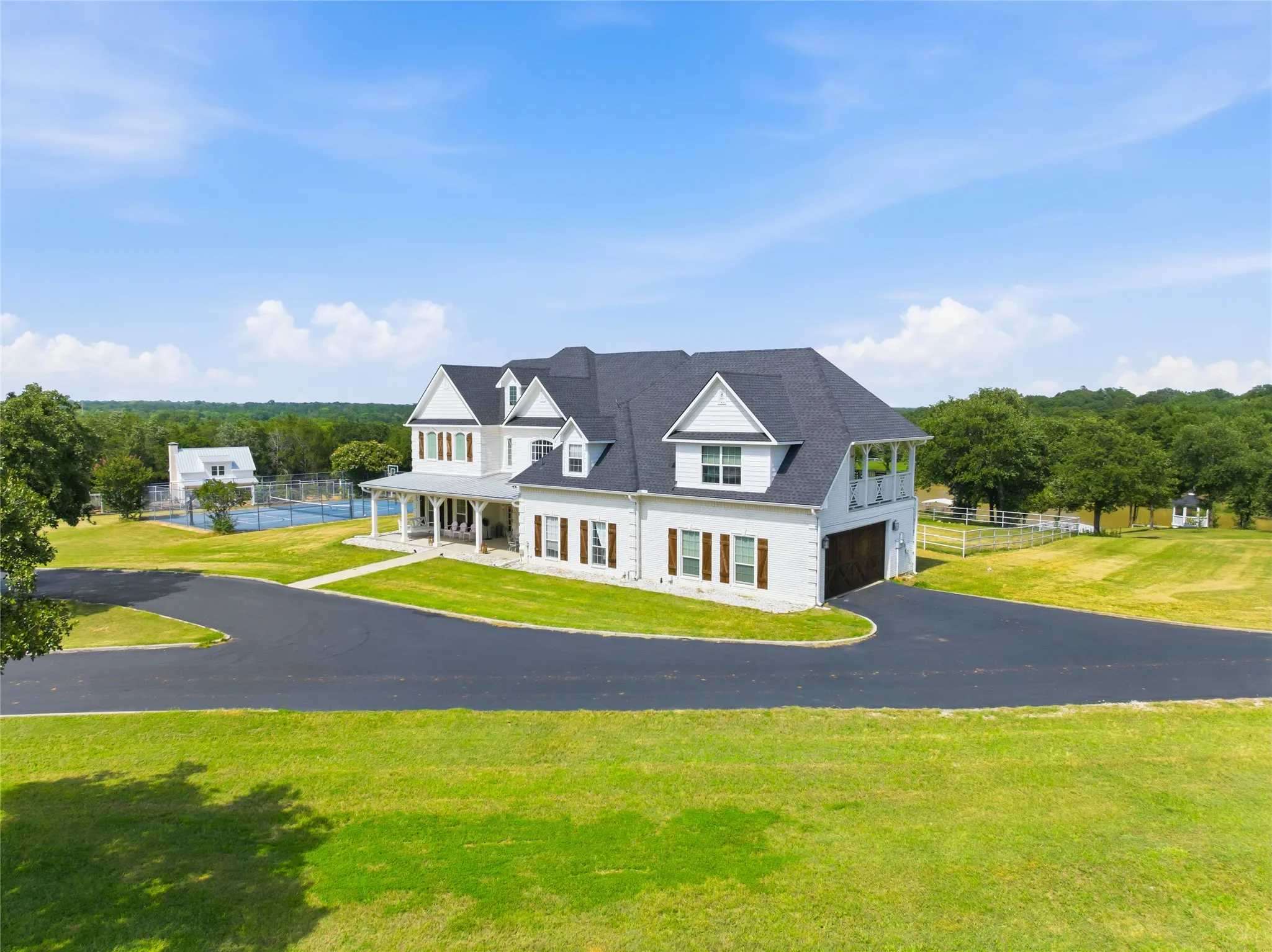A picture perfect homesite awaits you as you round the corner on the paved driveway.