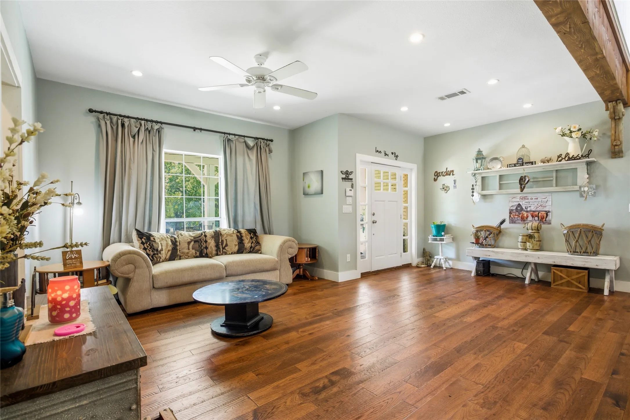 Looking back at the front door, a welcoming living area creates a feeling of home from the moment you walk in.