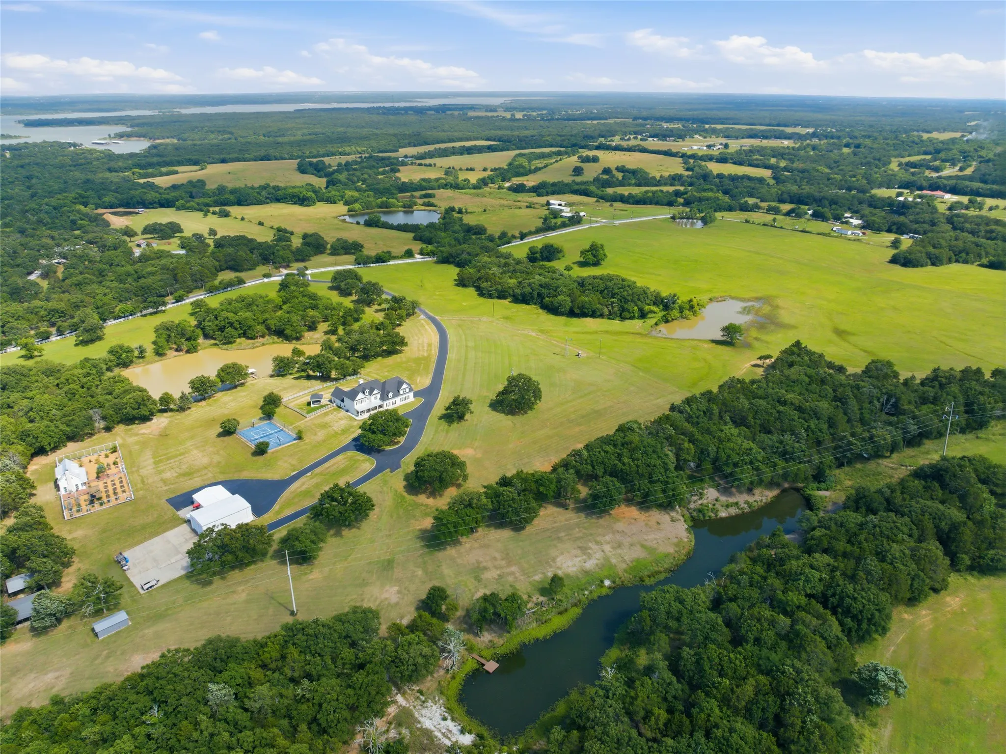 The lake is just a few miles from this 50 acre property that is surrounded by beautiful properties.