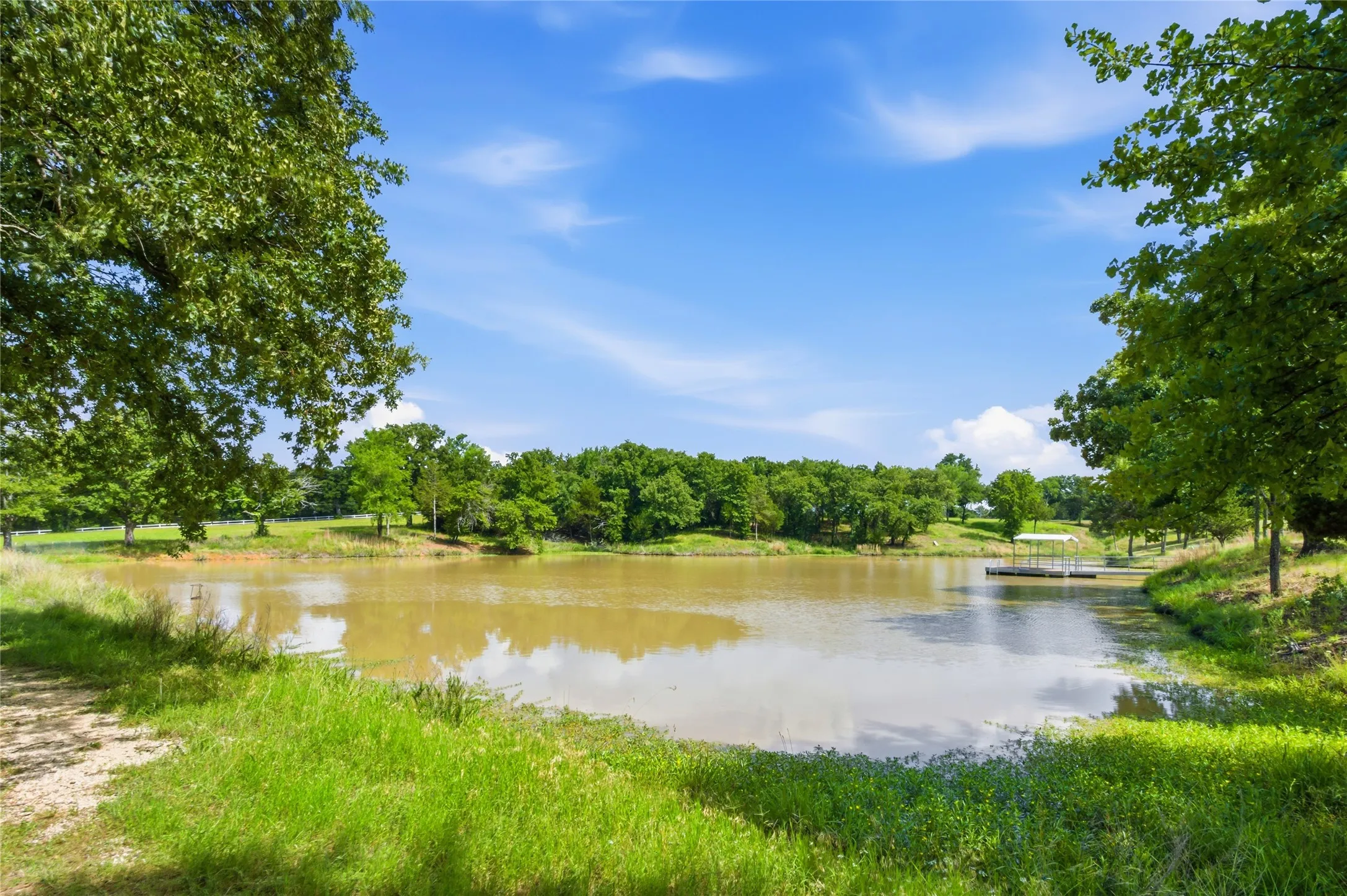 The pond is a definite highlight!  Spend long summer afternoons under the shade of the big trees or lounging in the dock area.  This pond is a fed pond so it does not run dry.