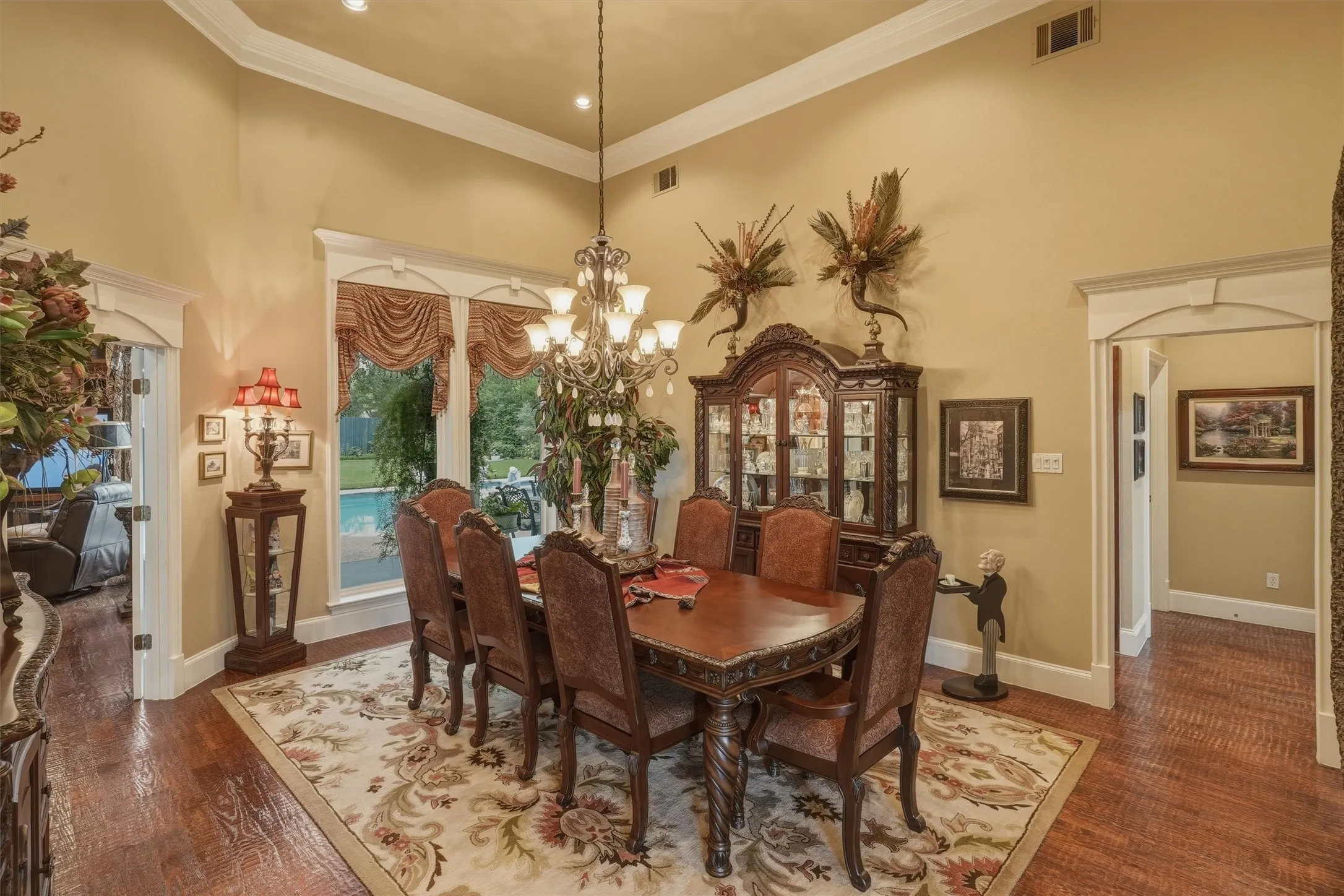 Large formal dining with hand scraped hard wood flooring.