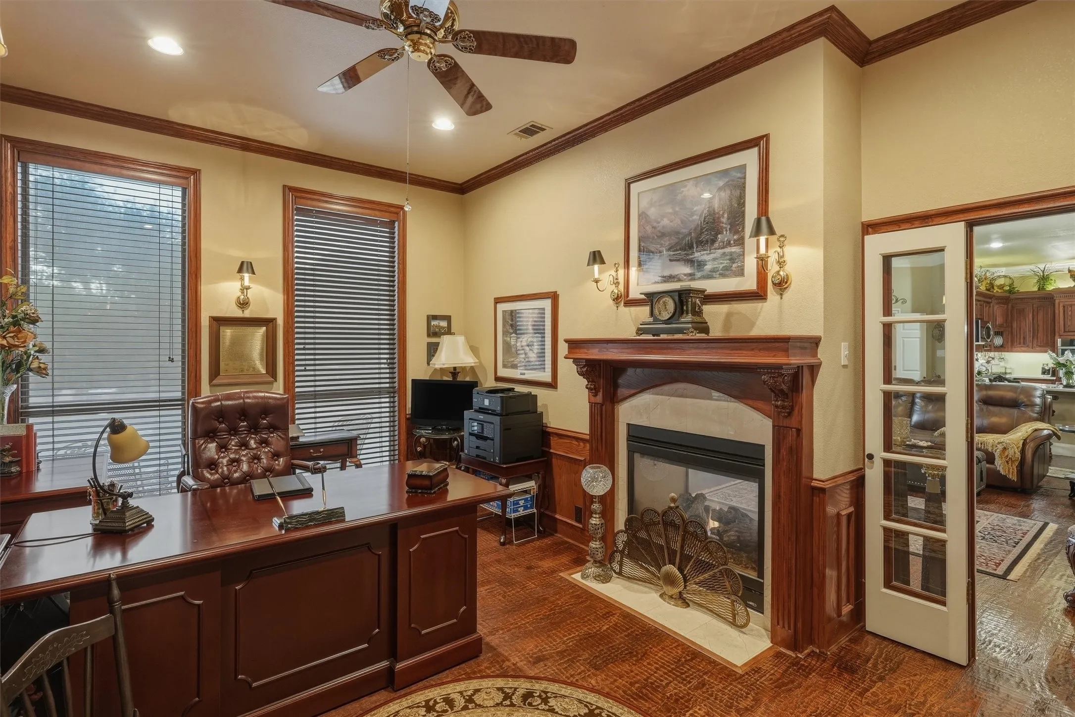 Home office with fireplace.