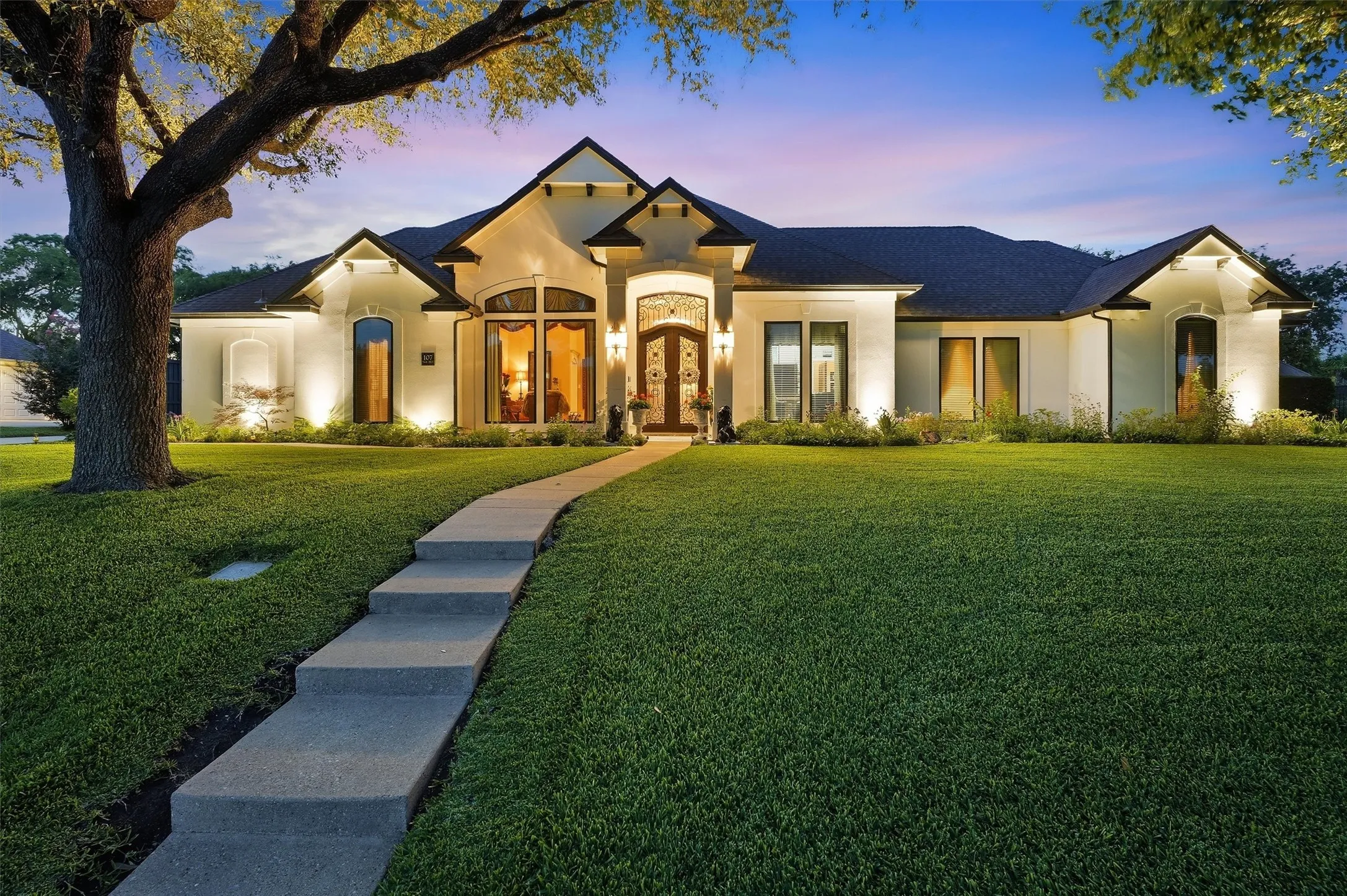 Very well manicured front lawn.