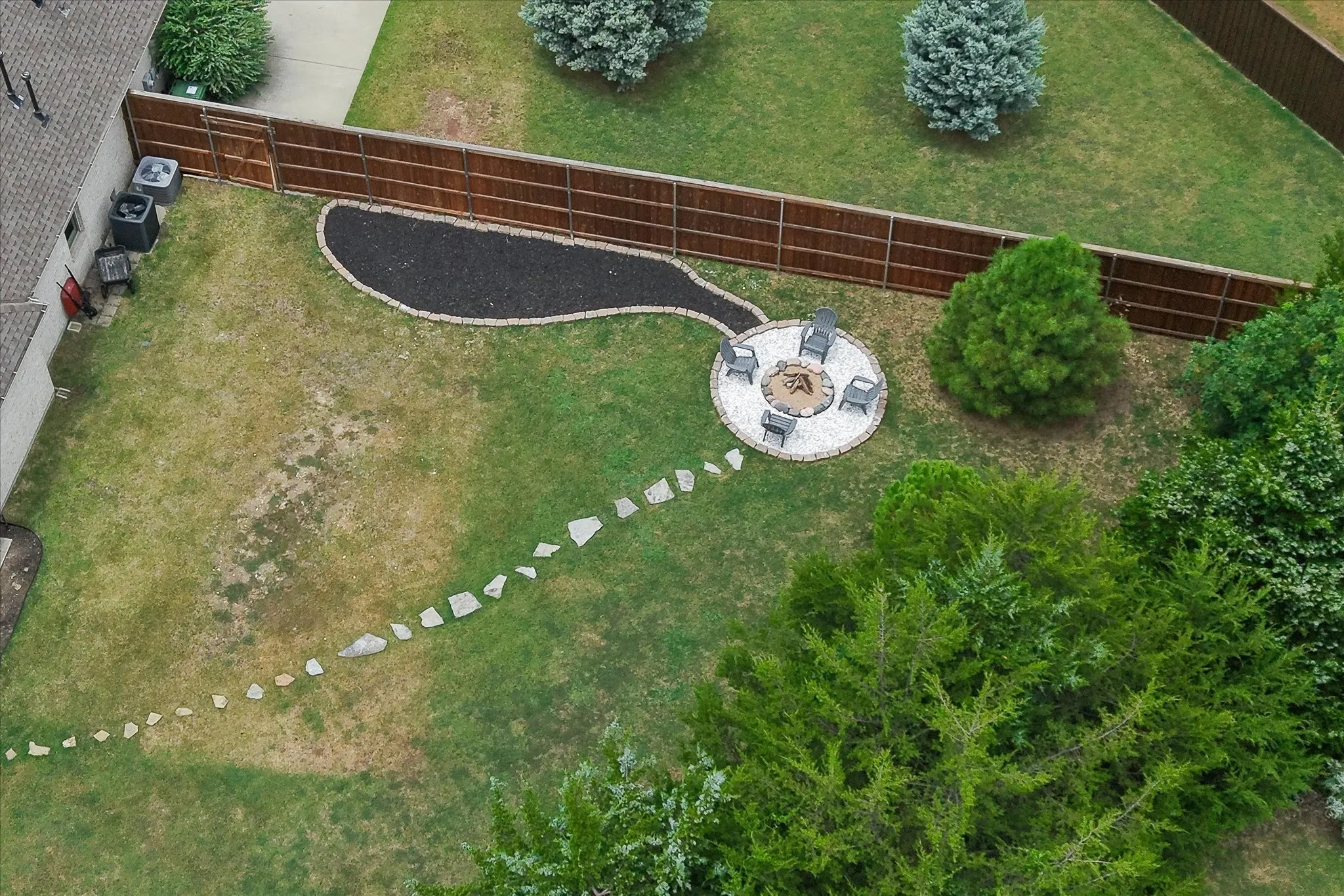 Fire Pit on backside of backyard