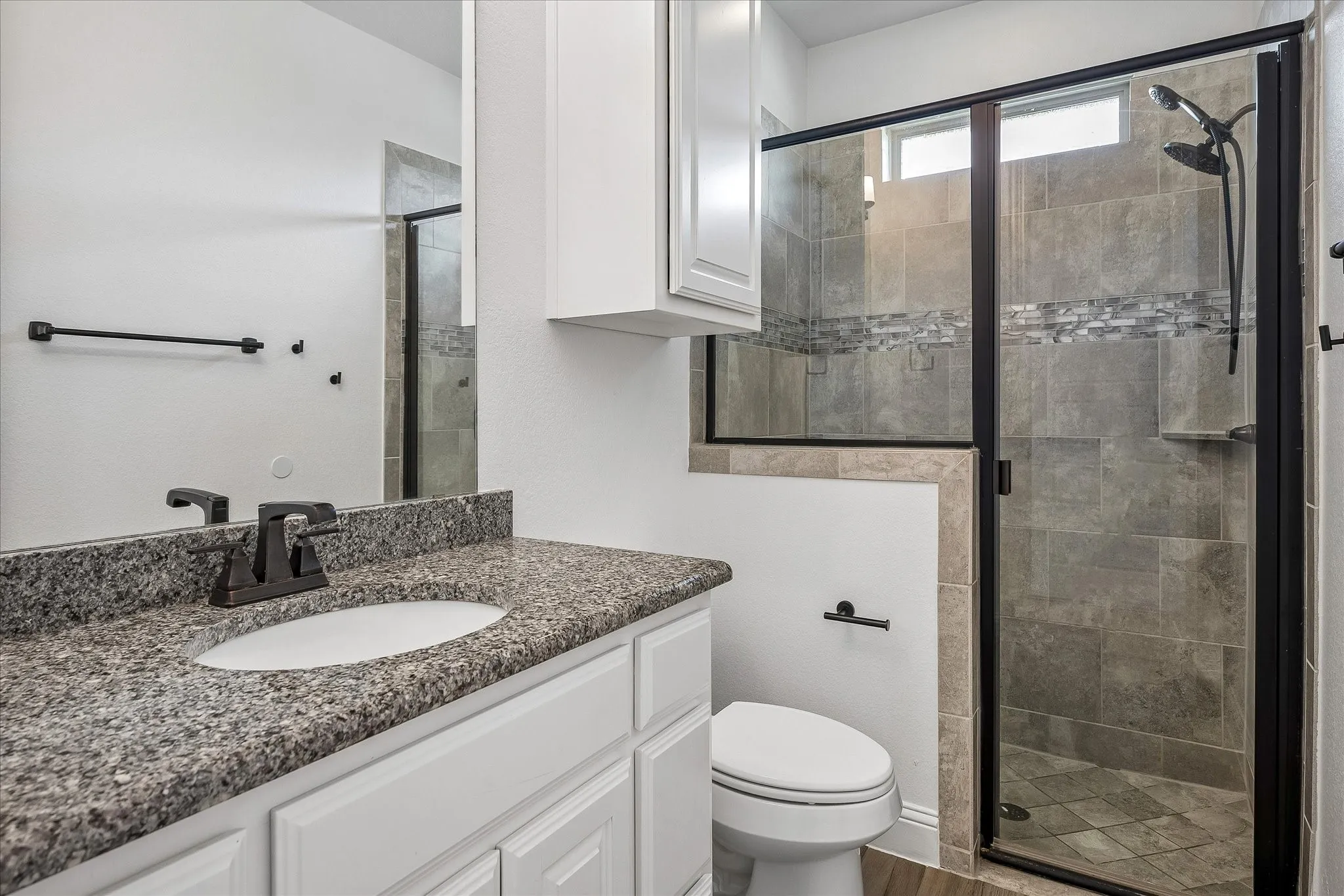 Bathroom has walk-in shower